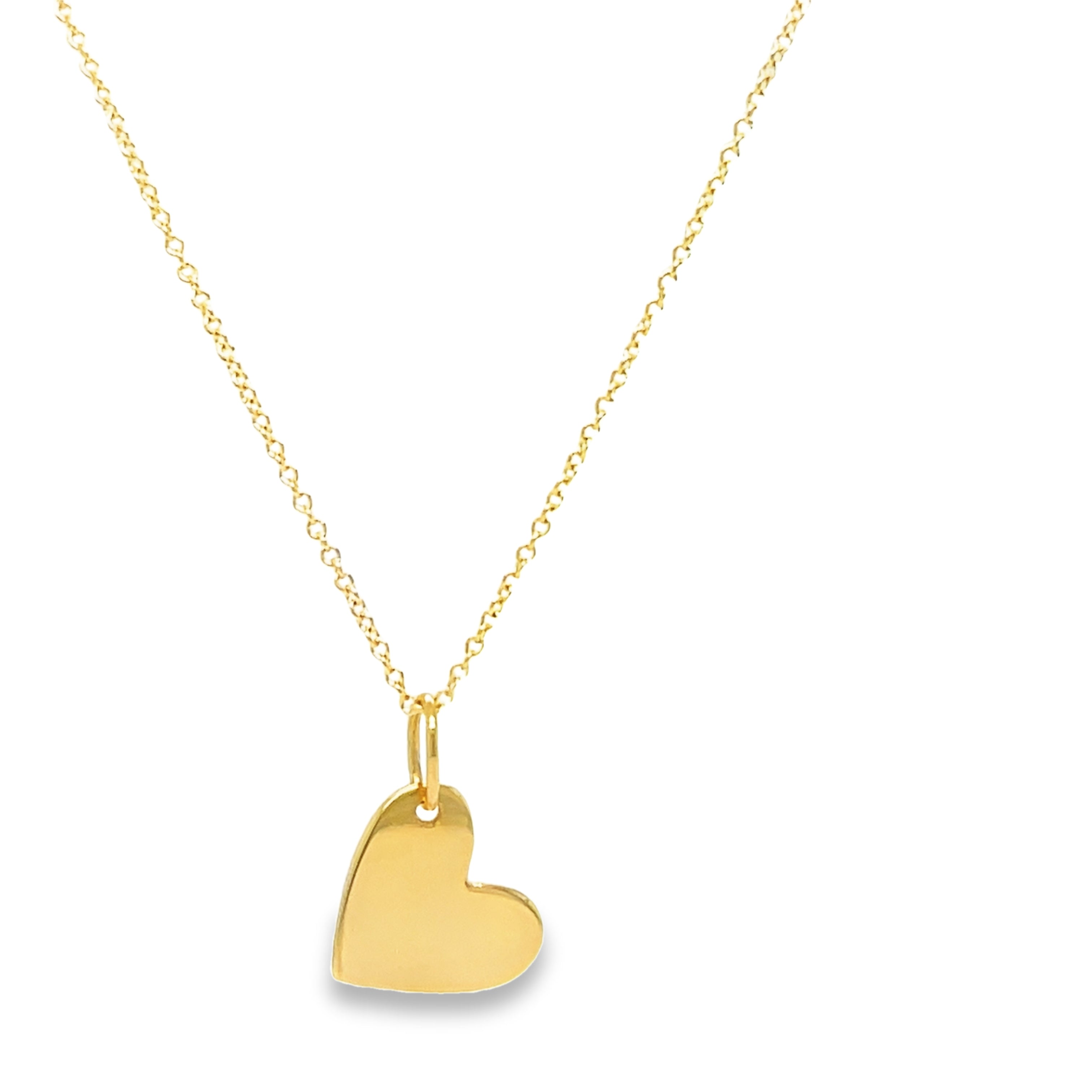 "Fall in love with this stunning 14k Yellow Gold Tilted Heart Necklace. The 18" chain delicately holds a 12.00 mm heart pendant, all crafted from high-quality 14k yellow gold. Add a touch of elegance and romance to any outfit with this beautiful necklace."