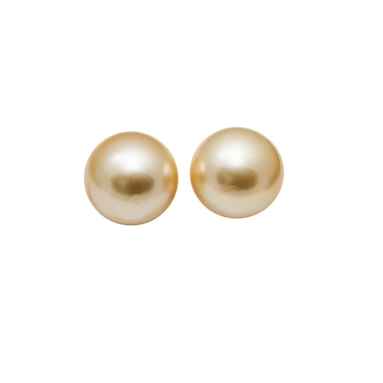 Enchanting cultured, golden South Sea pearls, 11mm in size, captivate the eyes with their gleaming luster. Skillfully cradled in 14k yellow gold cups, they are comfortably secured with a precision screw back system.