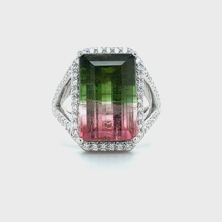 This stunning watermelon tourmaline and diamond cocktail ring is crafted in 14k white gold. It's set with a watermelon tourmaline centerpiece and accentuated by a brilliant halo of diamonds for a truly unique look. Designed for special occasions, this sophisticated piece of jewelry will make a lasting impression.  This ring was made in our store  Size 6.5  19.00 x 16.00 mm