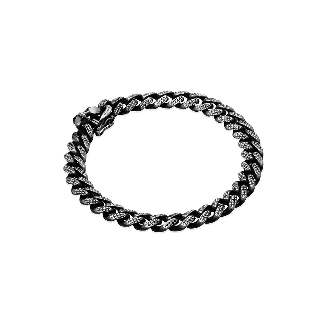 This Reversable Mens Gunmetal Miami Pyramid Bracelet is perfect for the fashion-forward man. Its unique sterling silver and gunmetal colors offer a contemporary, yet timeless aesthetic. This handcrafted bracelet is made in Italy with the highest grade of materials for enduring quality. Add this stylish accessory to your wardrobe and you'll be turning heads in no time.
