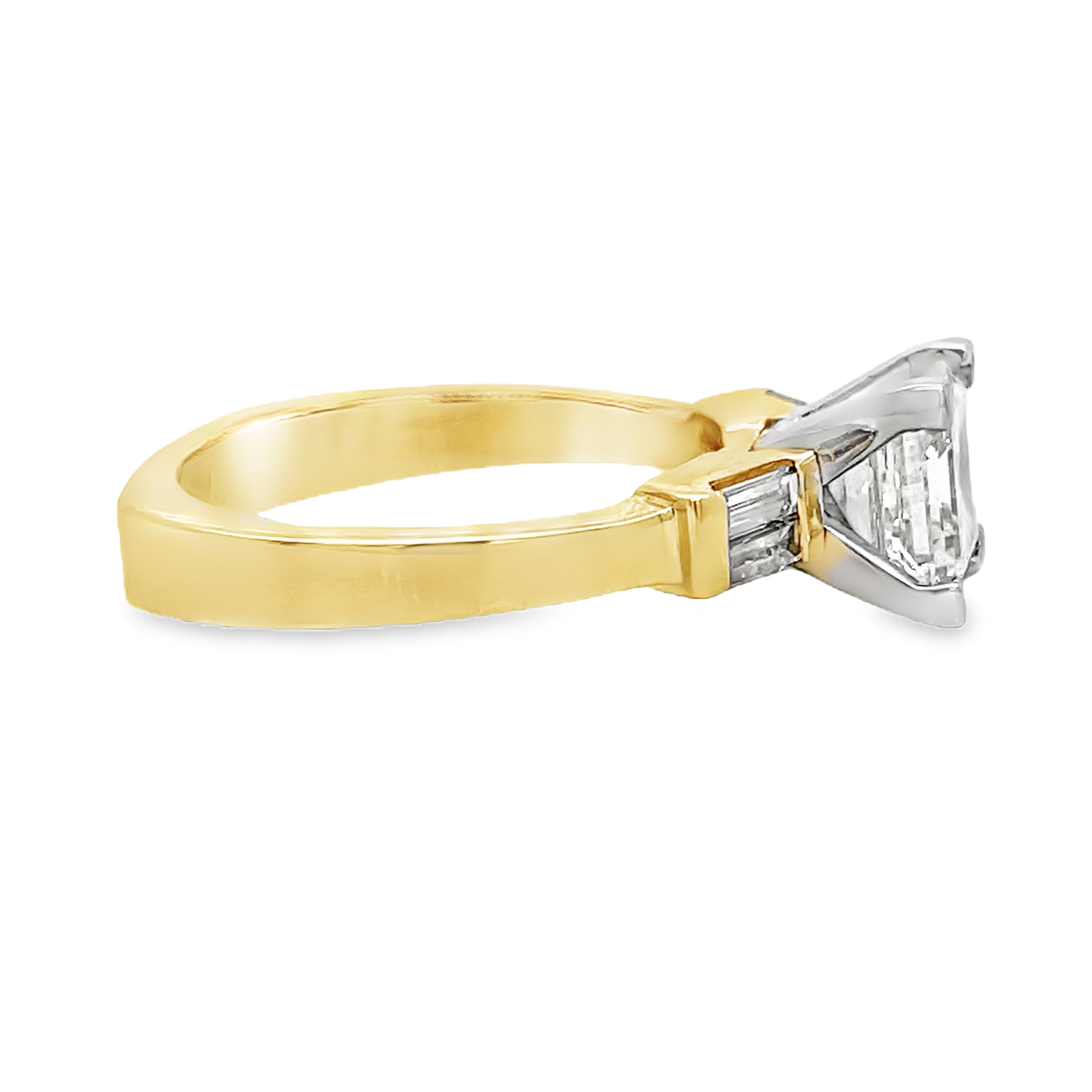 Indulge in the exquisite luxury of our Custom Made Assher Cut &amp; Baguette Engagement Ring, featuring a 14k yellow gold band adorned with a stunning 1.71 ct assher cut diamond in a prong setting. The color G and SI1 clarity ensure brilliance, while the delicate baguette diamonds on the side add a touch of sophistication. Elevate your proposal with this exclusive, one-of-a-kind ring.