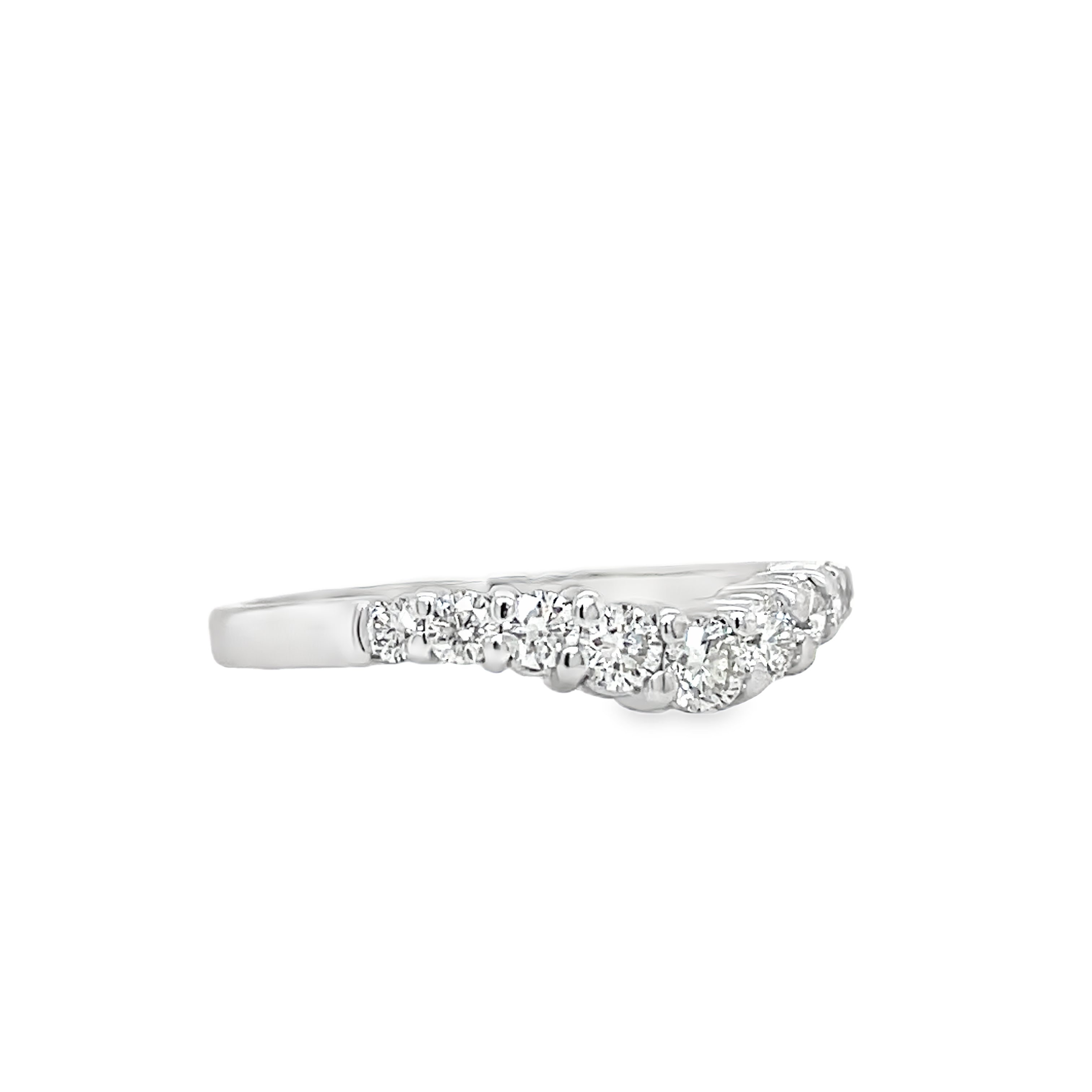 Indulge in the beauty of our Anniversary Diamond V- Shape Ring. Crafted in exquisite 14k white gold, this ring features a stunning v-shaped design adorned with sparkling round diamonds totaling 0.55 carats. With F/G color and VS1 clarity, it exudes a luxurious and exclusive aura, making it the perfect symbol of your eternal love.