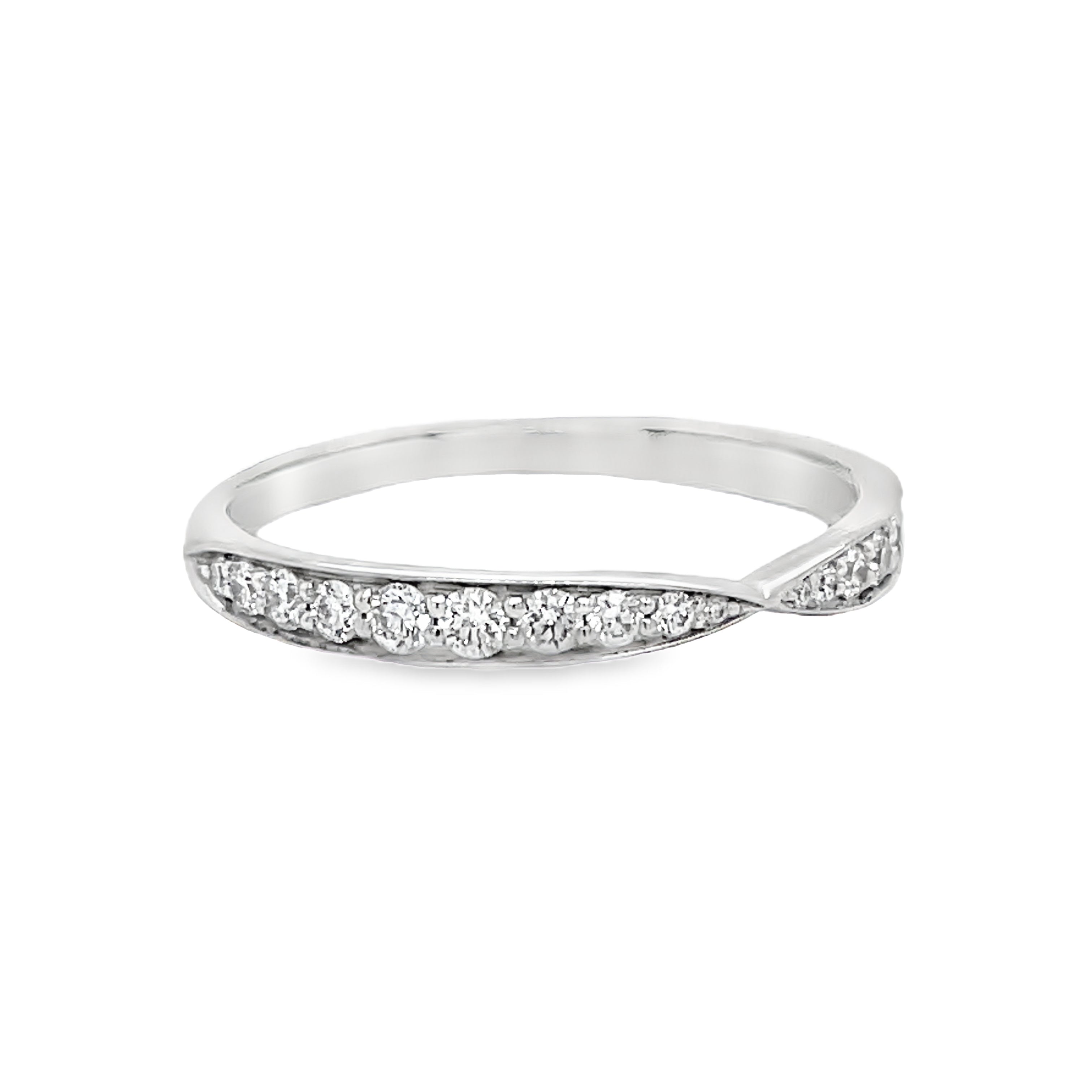 This stunning Estate Tiffany and Co. Diamond Wedding Band features a unique v-shape design adorned with brilliant round diamonds. Crafted from luxurious platinum, this band is an elegant and exclusive choice for your special day. Add a touch of sophistication and luxury to your wedding ensemble with this one-of-a-kind piece from Tiffany and Co.