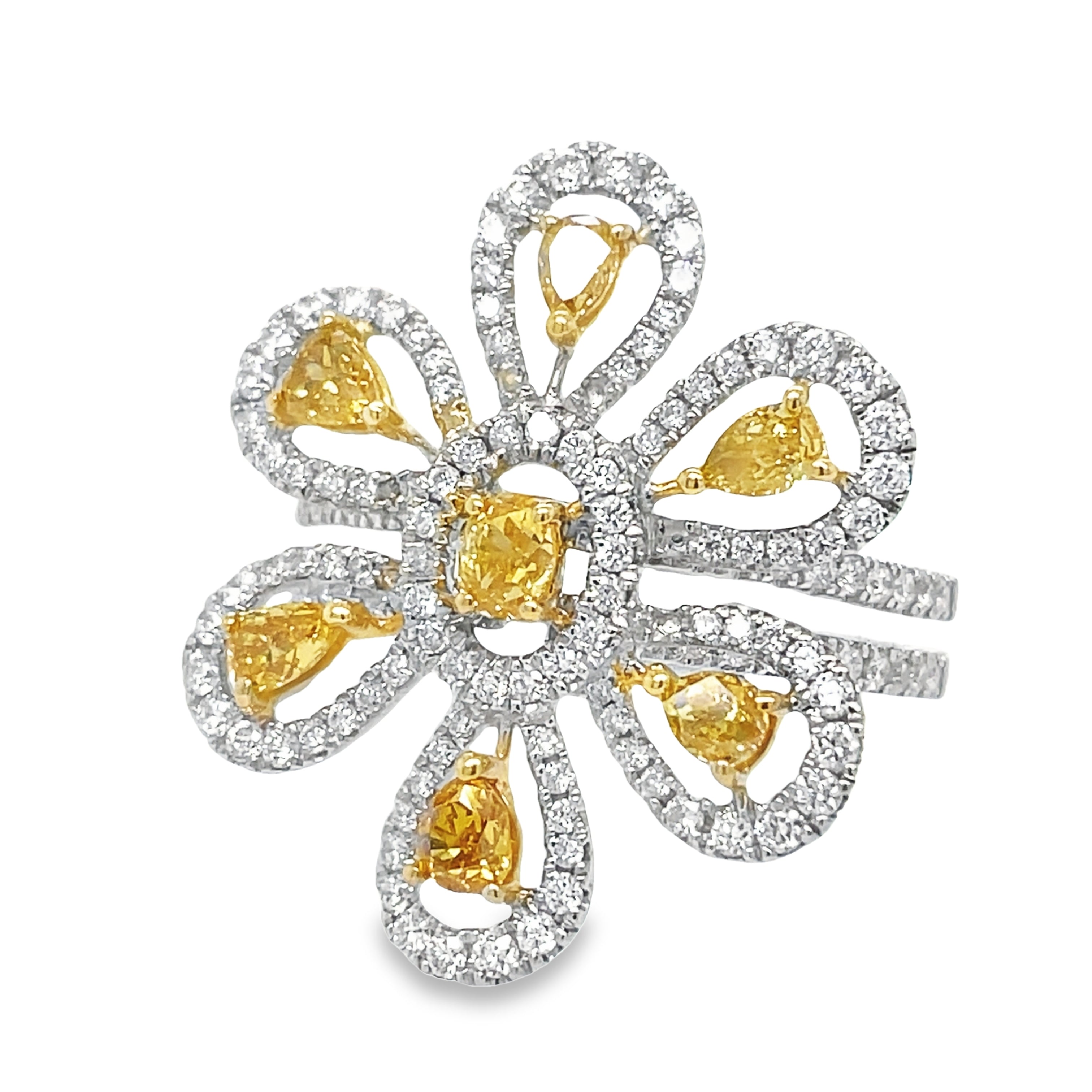 This exquisite cocktail ring features a stunning one-of-a-kind design, with a large diamond flower centerpiece surrounded by high-quality yellow diamonds 0.89 cts and round diamonds 0.82 cts. Crafted from 18k white gold, its double shank adds elegance and sparkle. Measuring 24.50 mm in width, this size 7 (sizeable) ring is a true statement piece.