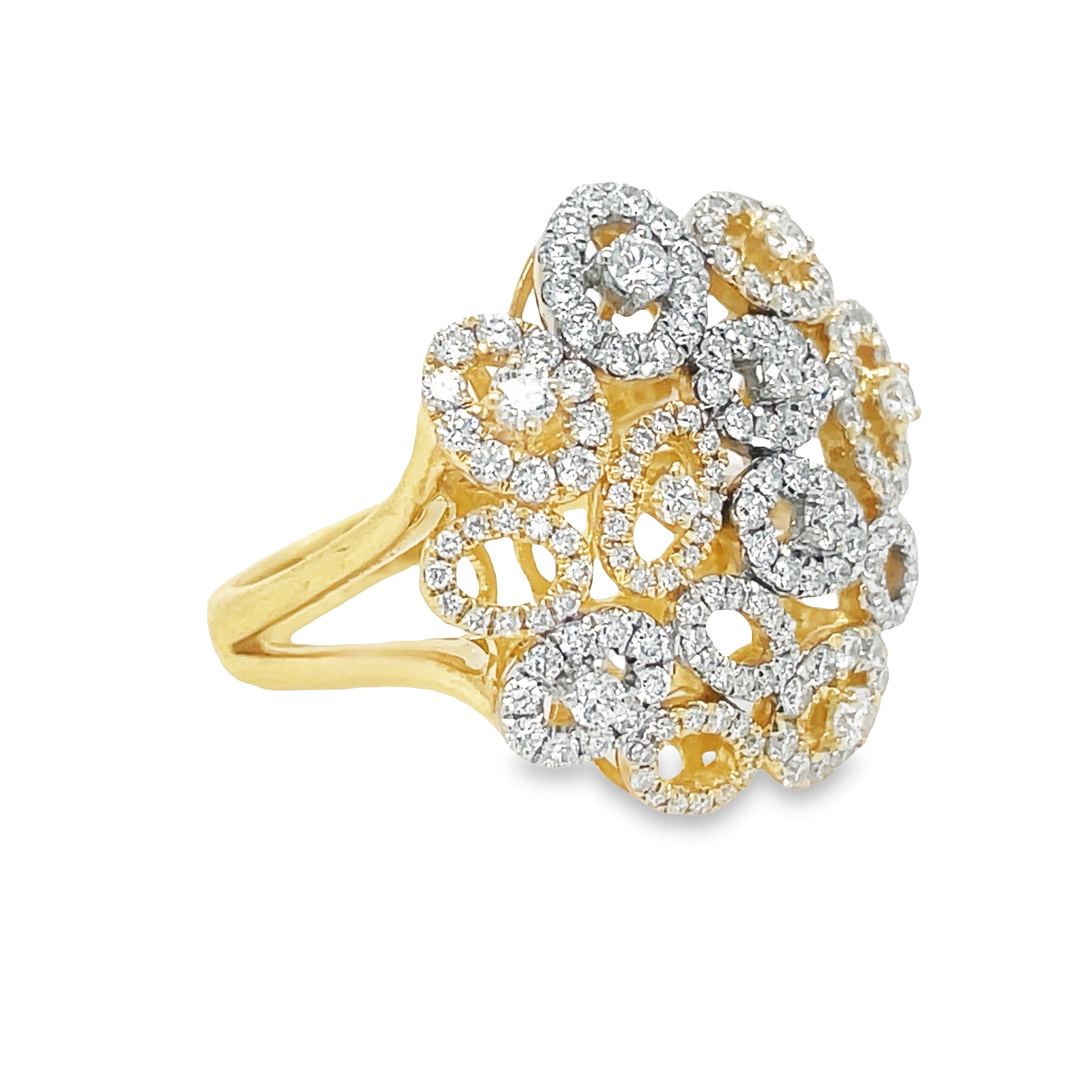 This modern fashion ring is crafted from 14K two tone gold and is adorned with a total of 1.31 round diamonds, arranged in a fancy cluster oval shape. The elegant design of this ring will add a striking and timeless finishing touch to any outfit.