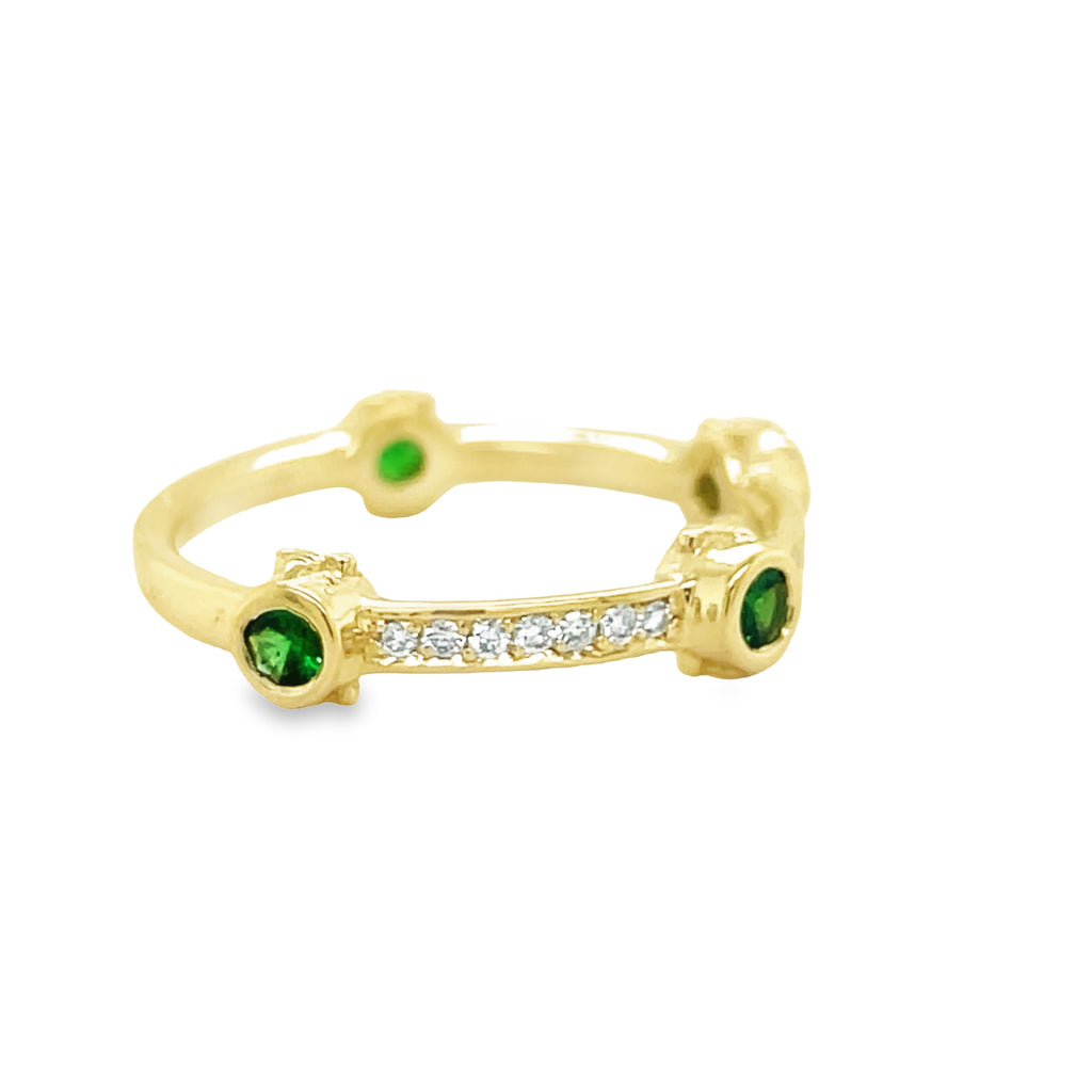 This 14k yellow gold ring having four tsavorite gems totaling 0.29cts, to symbolize the four cardinal points, and 0.14cts of round diamonds. Stand out from the crowd with this ultra-luxurious ring, sure to add a hint of sparkle to all your looks.