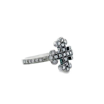 A sophisticated and bold accessory, the Black Diamond Cross Ring is crafted in 18k white gold and features a unique black rhodium design. Set with 0.63cts of elegant black diamonds, this stylish ring adds a creative touch to any ensemble.