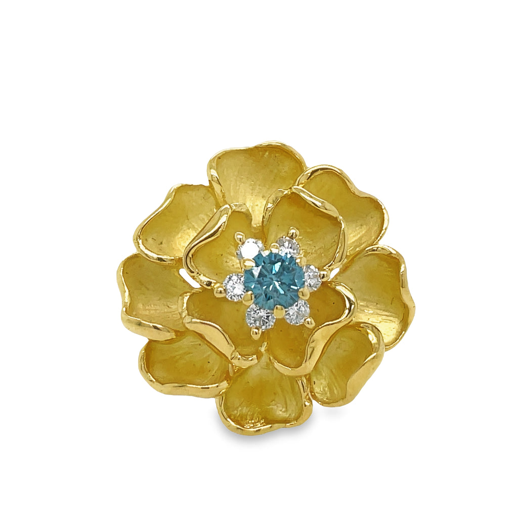 This stunning ring brings a unique sense of luxury to any look. Crafted from 18k yellow gold and featuring a beautiful blue diamond 0.16 cts along with round diamonds 0.28 cts, this ring adds the perfect finishing touch. Enjoy the Matte Finish of this elegant Blue Diamond Flower Ring