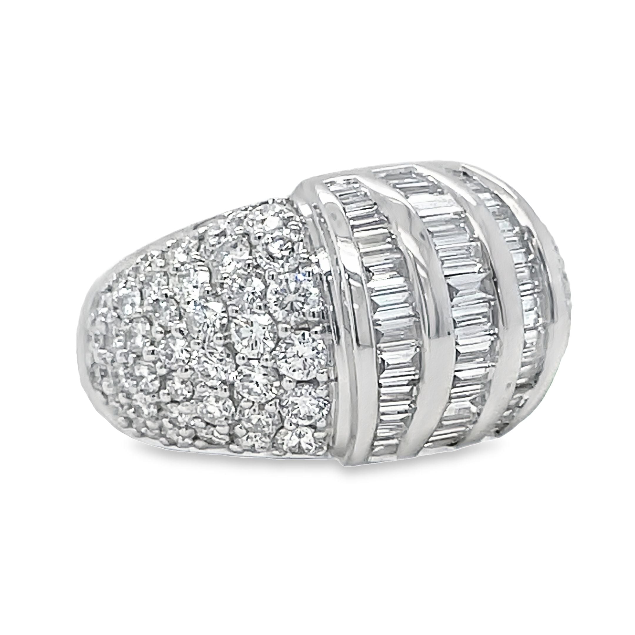 This stunning ring features a combination of round and baguette diamonds totaling 3.20 carats, set in 18k white gold. With a width of 13.00 mm, this ring is sure to make a bold statement. Perfect for those who appreciate classic design and luxurious materials.