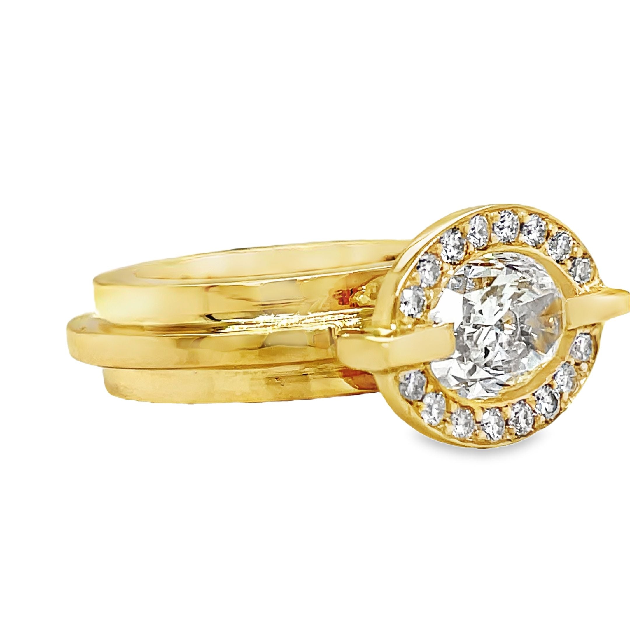 ndulge in luxury with our 18k Custom Made Diamond Staircase Ring. This stunning oval cut diamond, boasting a remarkable 2.01 carats, is set in 18k yellow gold with a handcrafted staircase gold style band. Radiate elegance with the sparkling clarity of color E, elevating any look to the next level.