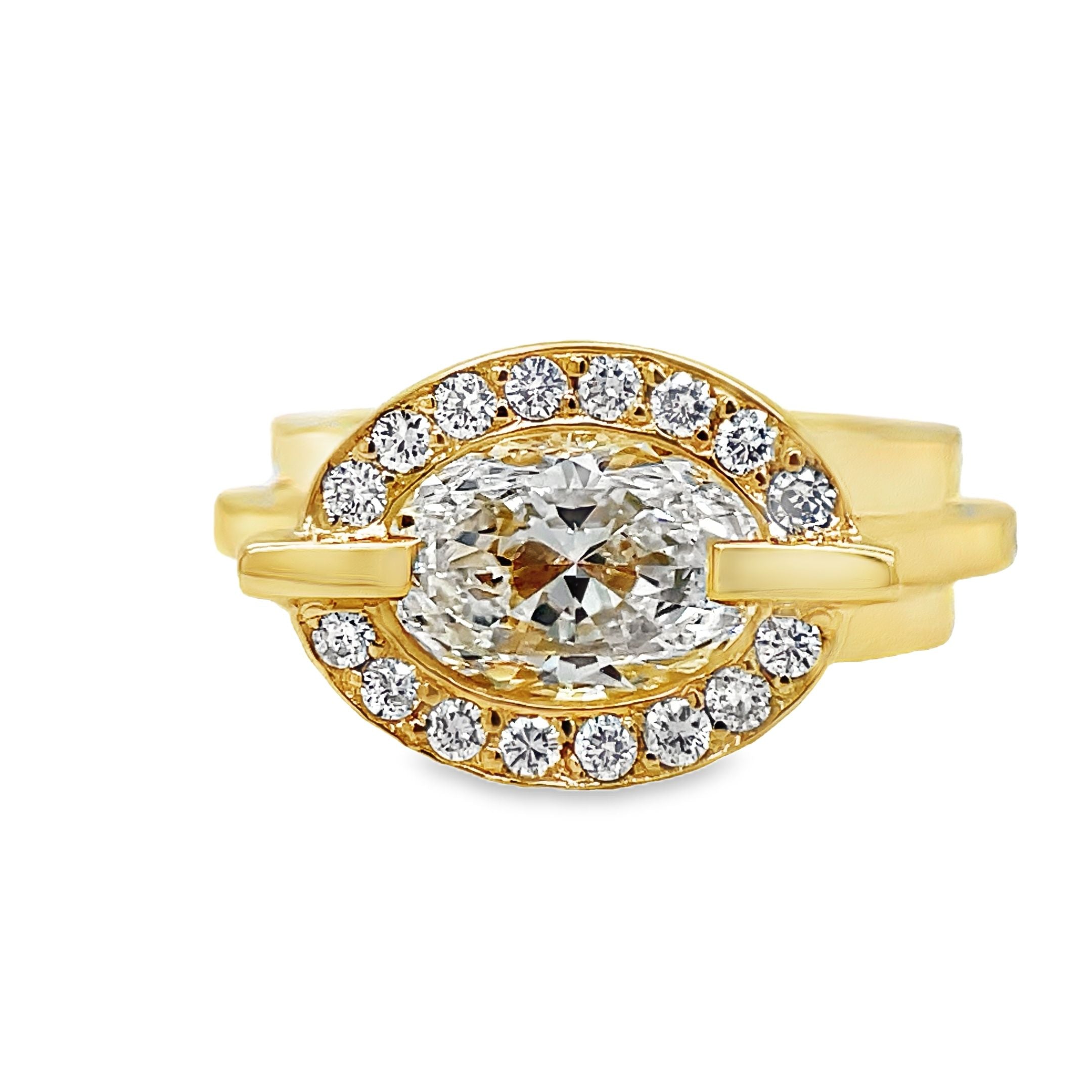 ndulge in luxury with our 18k Custom Made Diamond Staircase Ring. This stunning oval cut diamond, boasting a remarkable 2.01 carats, is set in 18k yellow gold with a handcrafted staircase gold style band. Radiate elegance with the sparkling clarity of color E, elevating any look to the next level.