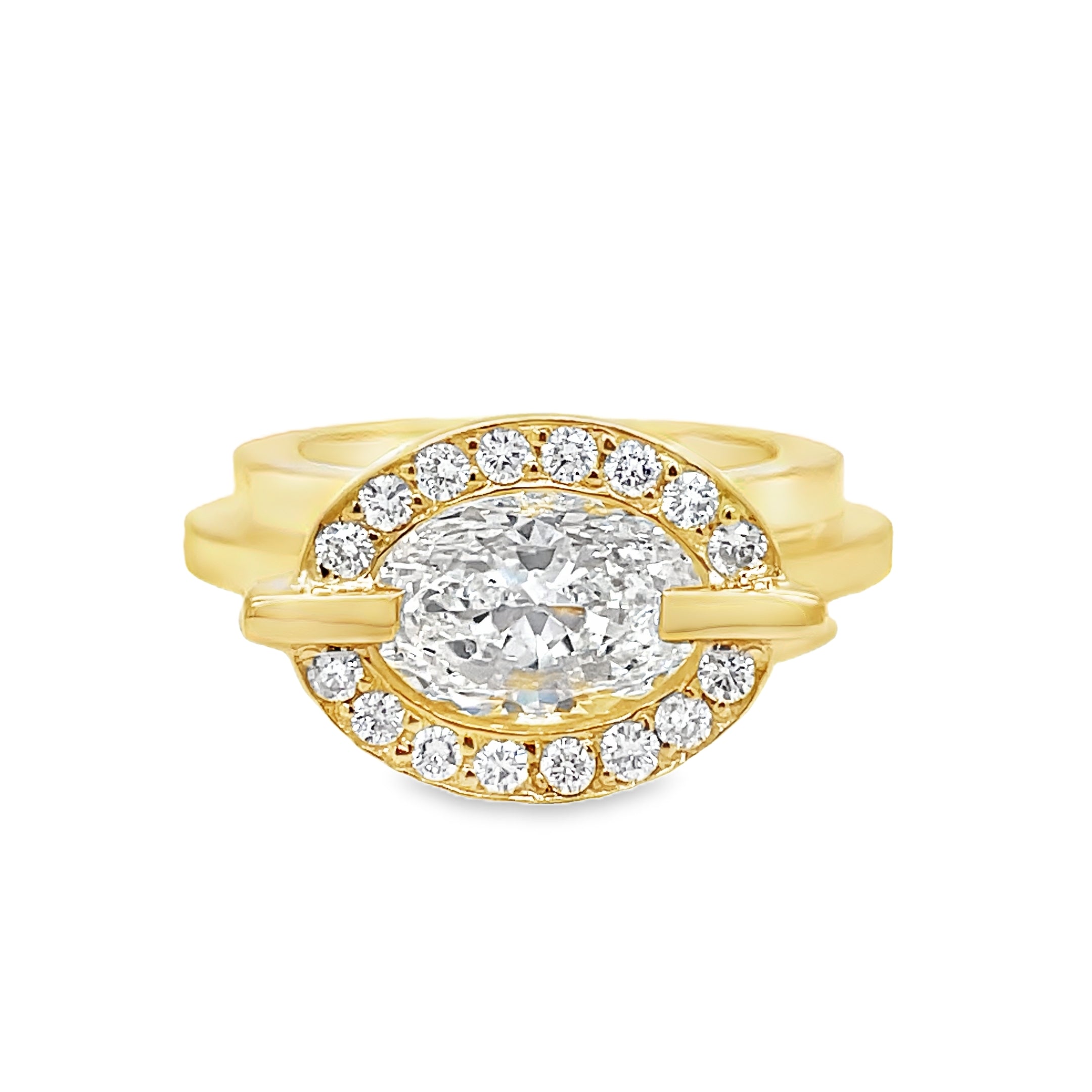 ndulge in luxury with our 18k Custom Made Diamond Staircase Ring. This stunning oval cut diamond, boasting a remarkable 2.01 carats, is set in 18k yellow gold with a handcrafted staircase gold style band. Radiate elegance with the sparkling clarity of color E, elevating any look to the next level.