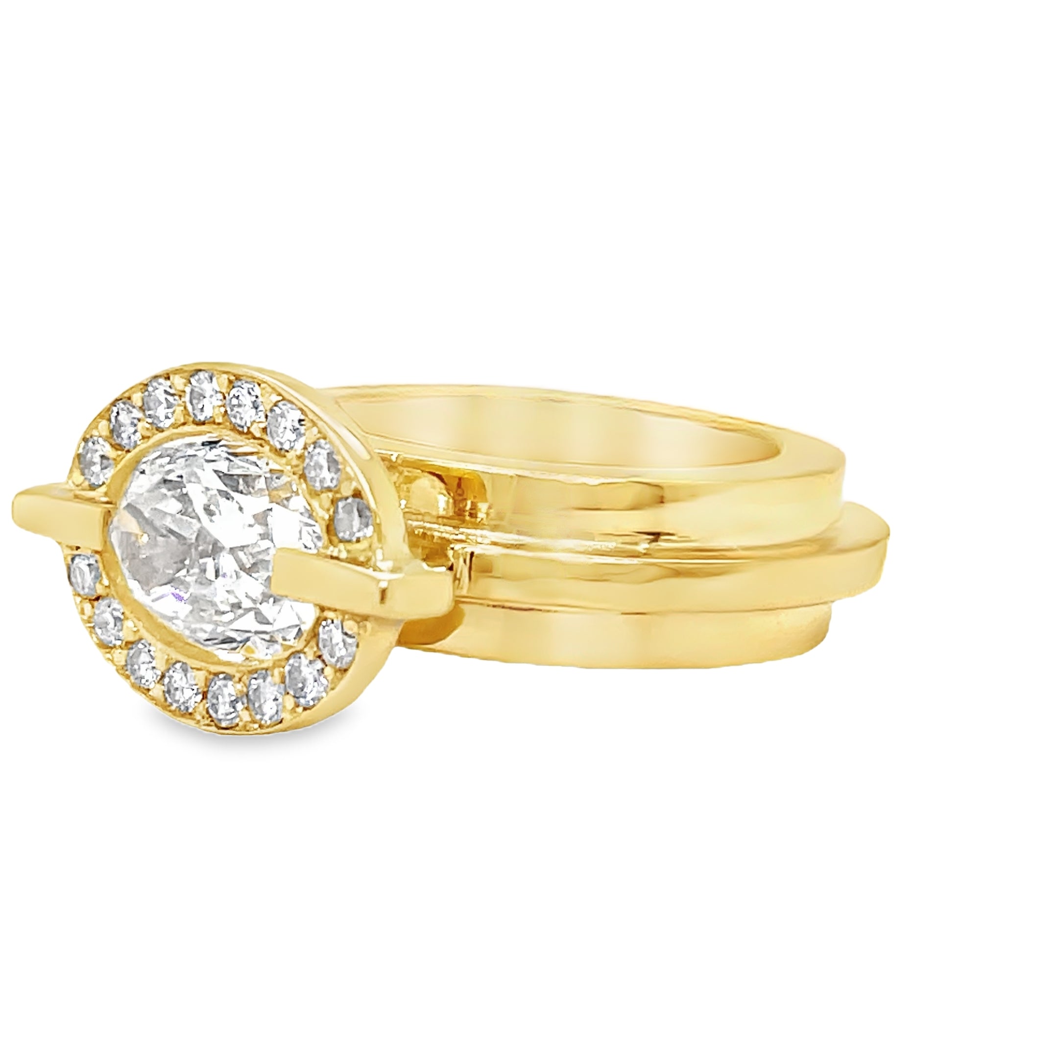 ndulge in luxury with our 18k Custom Made Diamond Staircase Ring. This stunning oval cut diamond, boasting a remarkable 2.01 carats, is set in 18k yellow gold with a handcrafted staircase gold style band. Radiate elegance with the sparkling clarity of color E, elevating any look to the next level.