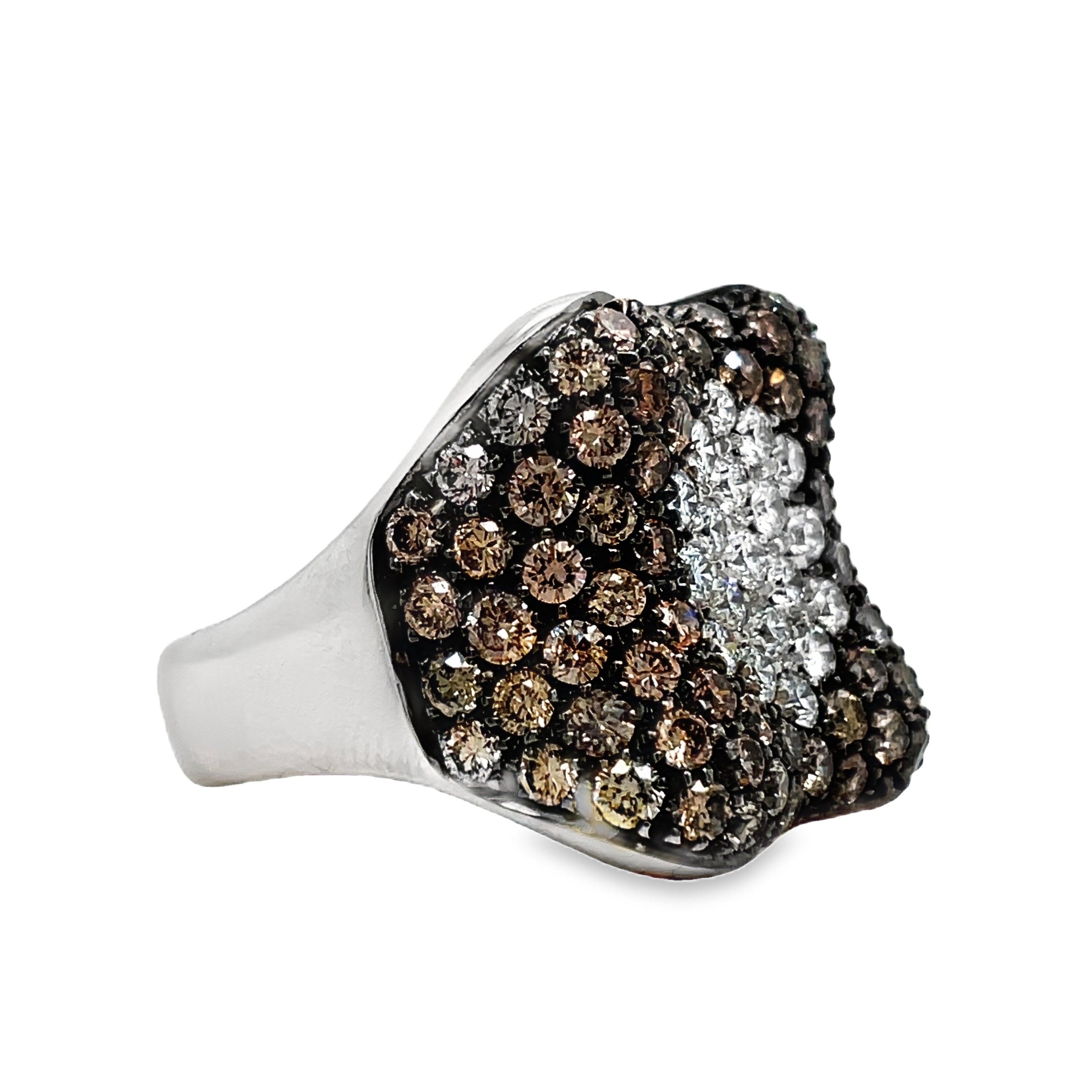 Indulge in the ultimate luxury with our Italian-made Black and White Diamond Pave Cocktail Wide White Gold Ring. Crafted from 18k white gold and adorned with 3.23 cts of black round diamonds and 0.62 cts of white round diamonds, this wide fashion ring exudes sophistication. Don't settle for ordinary, make a statement with our stunning pave set design.