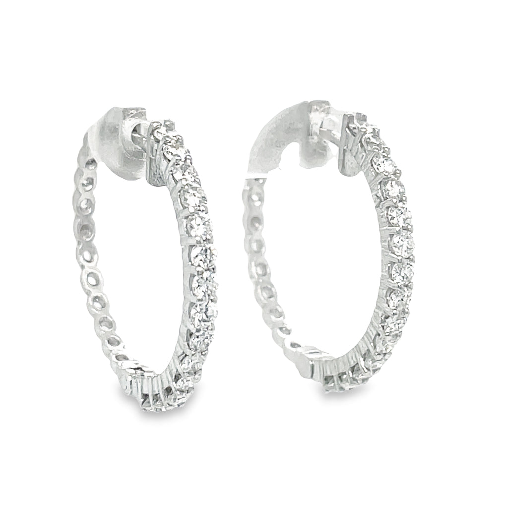 These Large Hoop Earrings feature 1.16 ct Round diamonds of F/G color and VS1 clarity. The hoops are 2.00 mm thick and 23.00 mm long, crafted from 14k white gold with a secure lock clasp. Lever back system ensures the earrings are easy to put on and take off.  