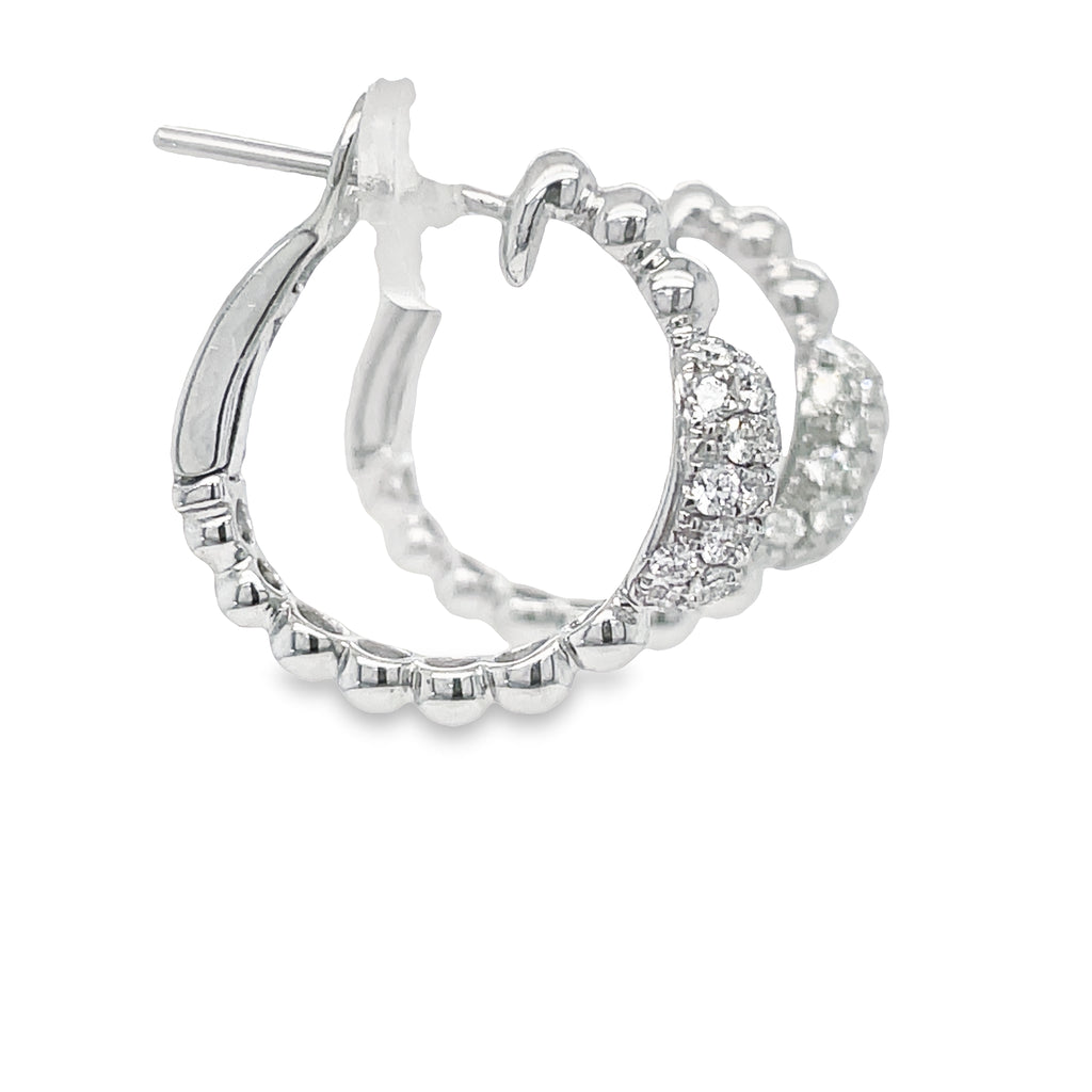 These 0.75-carat diamond hoop earrings crafted from 14k white gold boast an elegant bead style, perfect for any occasion. A timeless addition to your jewelry collection.