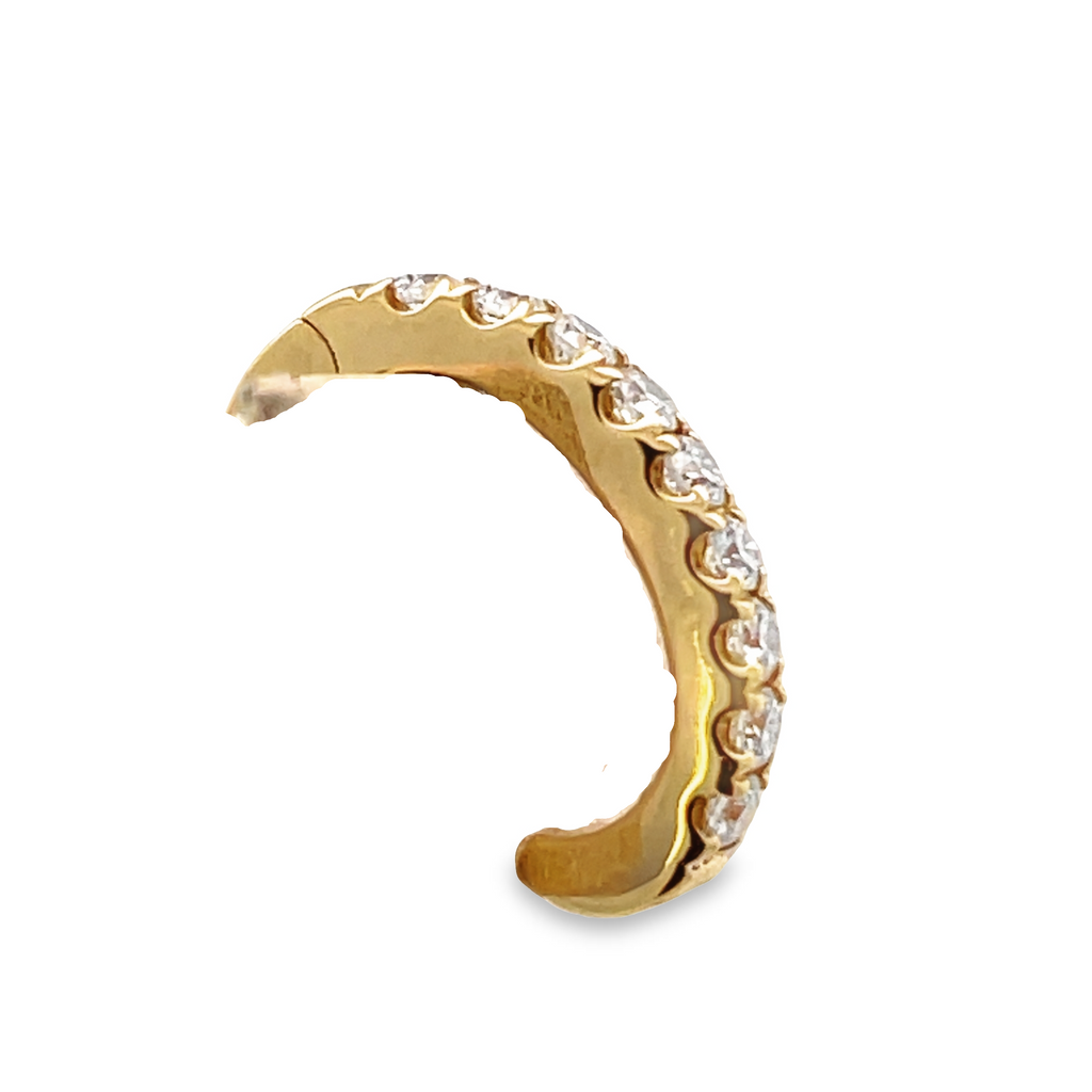 This gorgeous 18K yellow gold cuff earring is set with 0.23 cts of round diamonds (F color) that sparkle from every angle. Lightweight and easy to wear, this earring is perfect for any special occasion.   