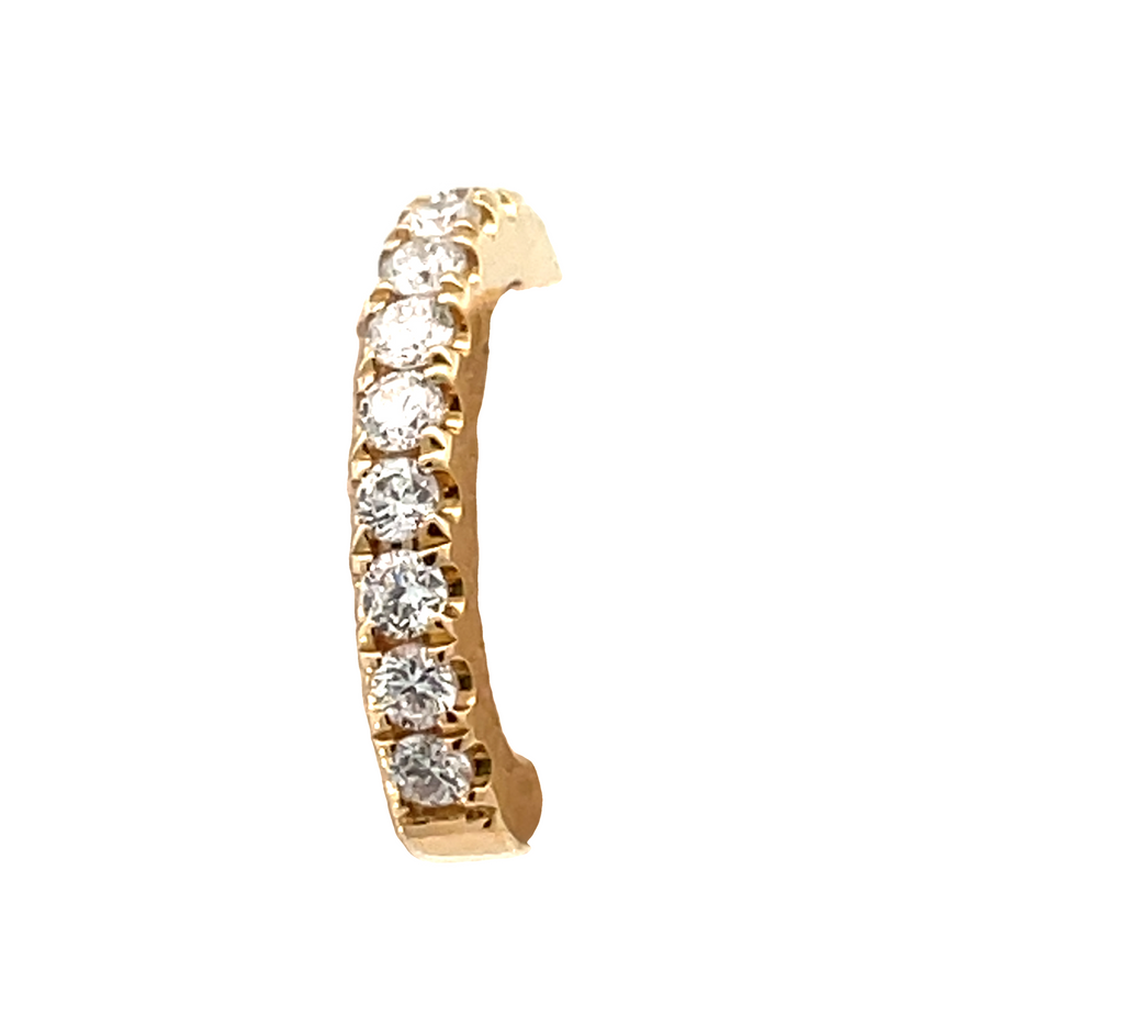 This gorgeous 18K yellow gold cuff earring is set with 0.23 cts of round diamonds (F color) that sparkle from every angle. Lightweight and easy to wear, this earring is perfect for any special occasion.