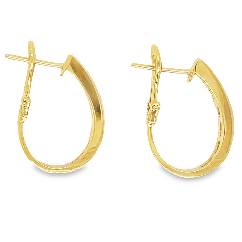These oval shape gold bezel hoop earrings feature 1.50 ct round diamonds of F/G color and VS1 clarity. The hoops are 4.50 mm thick and 1" long, crafted from 14k yellow gold with a secure omega clasp. Lever back system ensures the earrings are easy to put on and take off.