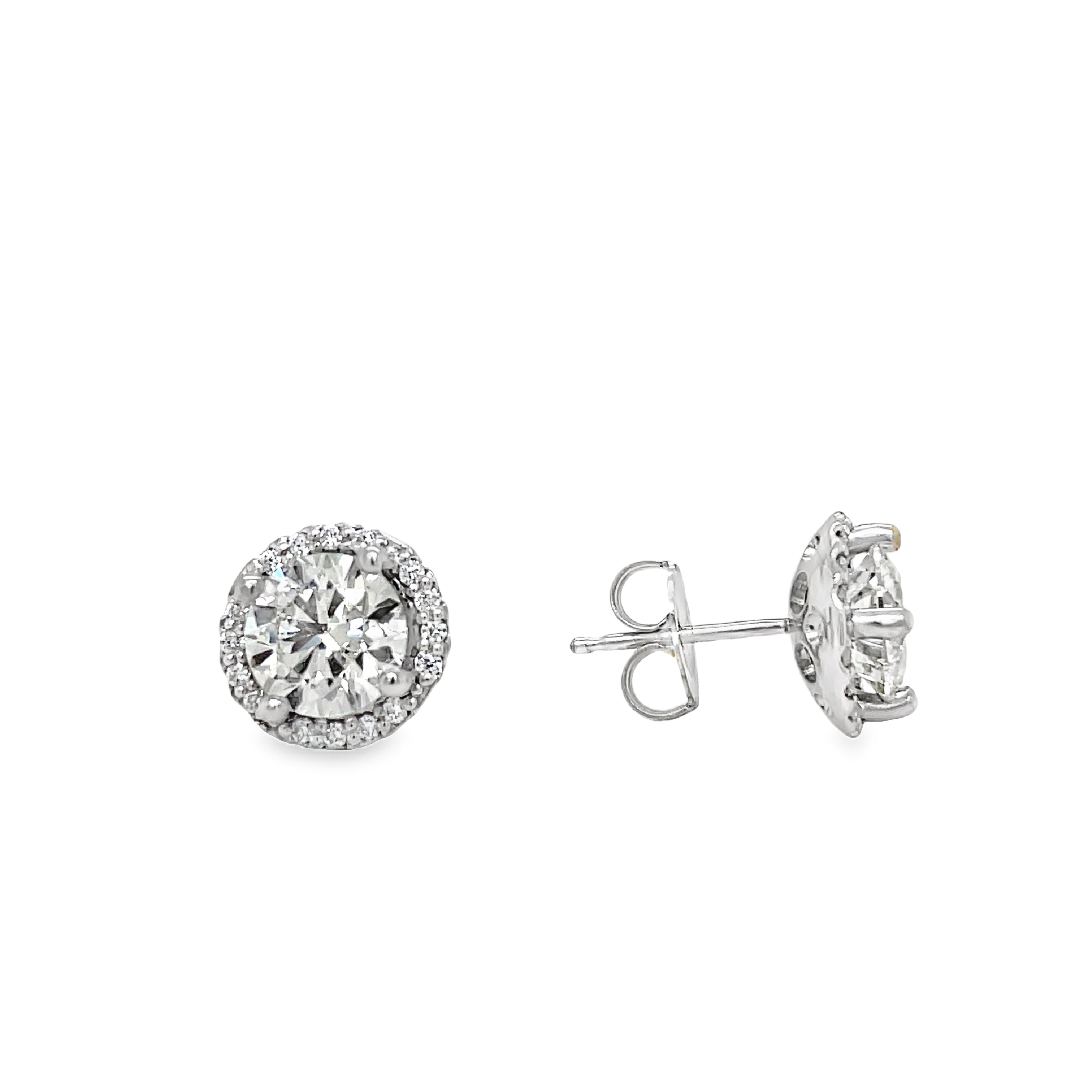 Add a touch of elegance and luxury to any outfit with our Diamond Studs and Jackets set. Featuring 2.09 cts of sparkling diamond studs with friction backs, and complemented with 0.50 cts of shimmering diamond jackets. With a color grade of I/J and clarity of SI2, this set is both sophisticated and exclusive.