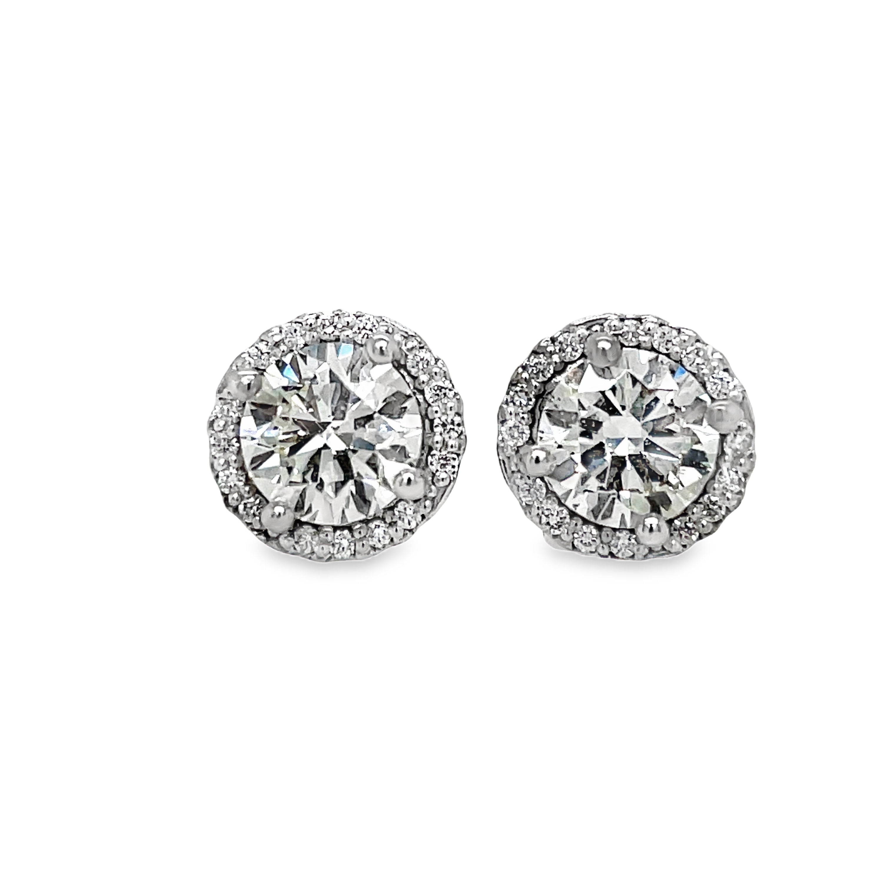 Add a touch of elegance and luxury to any outfit with our Diamond Studs and Jackets set. Featuring 2.09 cts of sparkling diamond studs with friction backs, and complemented with 0.50 cts of shimmering diamond jackets. With a color grade of I/J and clarity of SI2, this set is both sophisticated and exclusive.