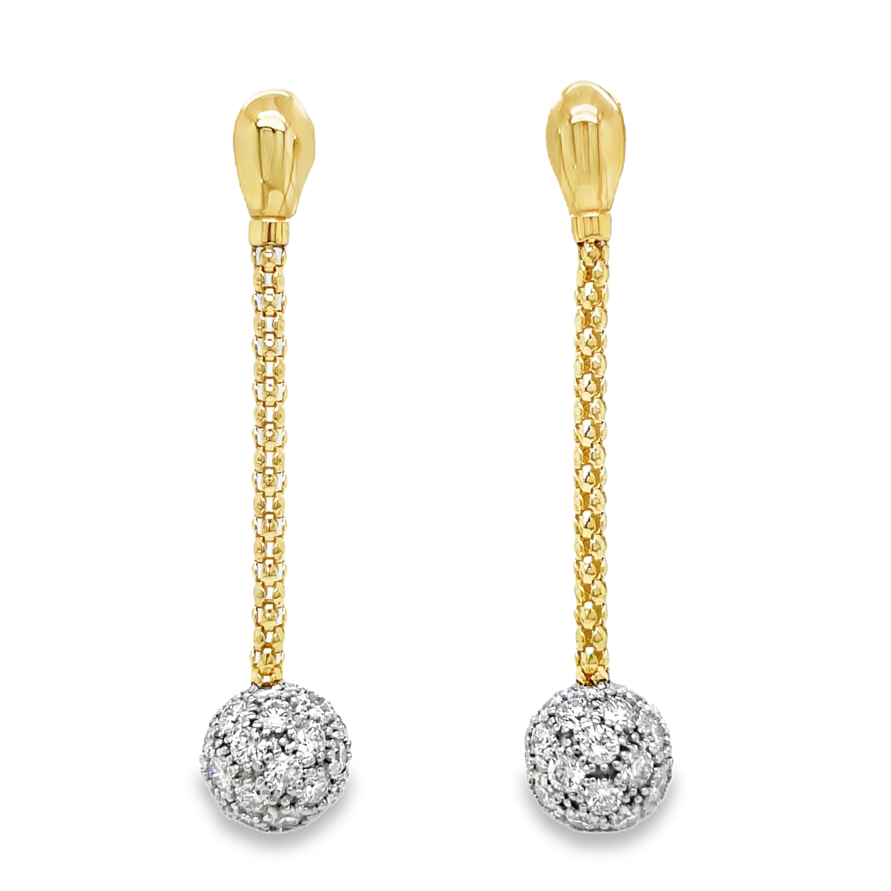 Indulge in luxury with our 18k Yellow Gold Diamond Long Earrings from Stella Milano. These elegant drop earrings feature diamond ball accents and sparkling pave diamonds, all set in stunning 18k yellow gold. With secure friction backs, you can wear them with confidence to any occasion. Elevate your look with these exclusive earrings.