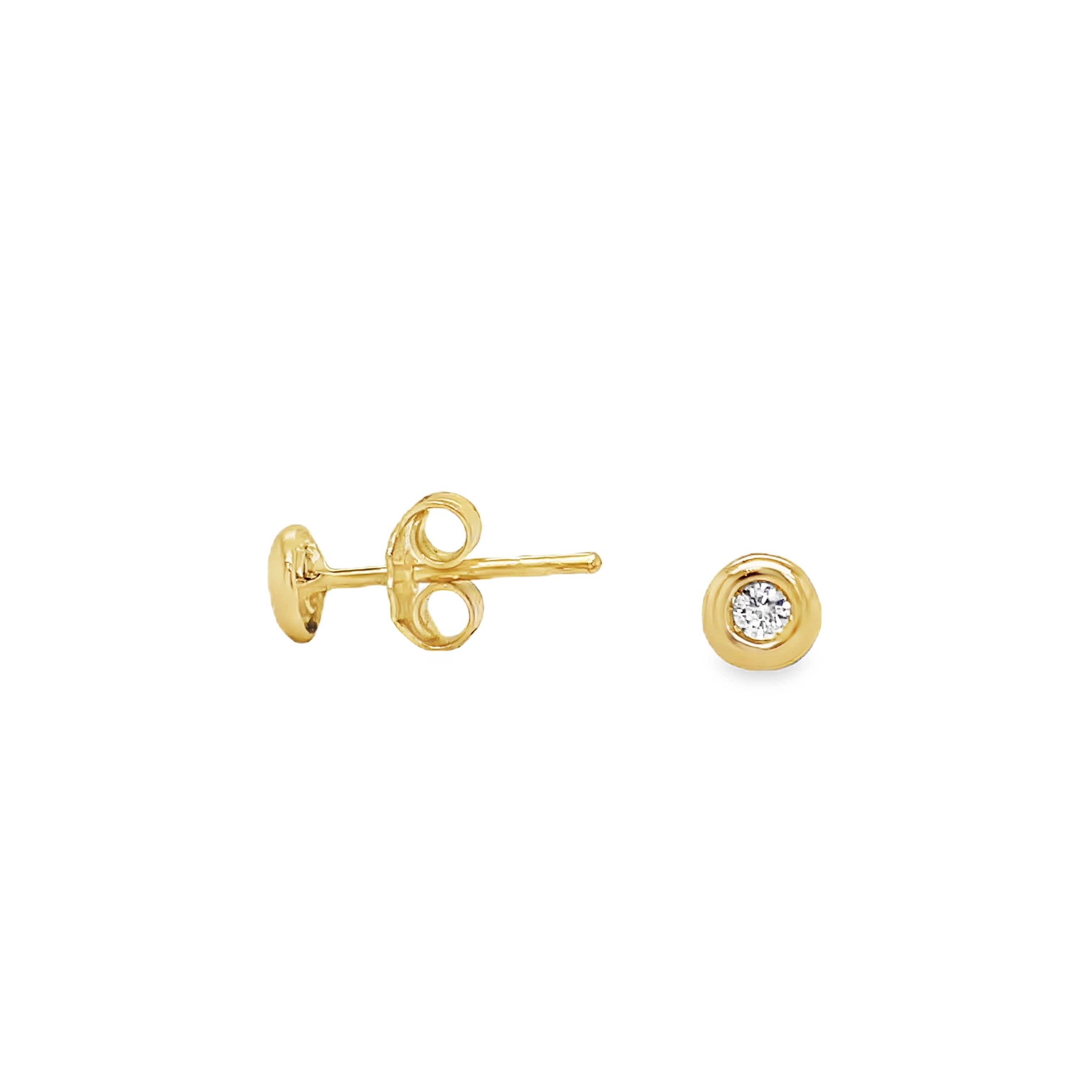 Elevate your style with our Diamond Stud Earrings. Crafted in 18k yellow gold, these dainty earrings feature 2 small diamonds totaling 0.06 carats, set in a secure bezel. With heart-shaped friction backs, they offer both elegance and secure wear. At 4.50 mm long, these earrings make a subtle yet luxurious statement.