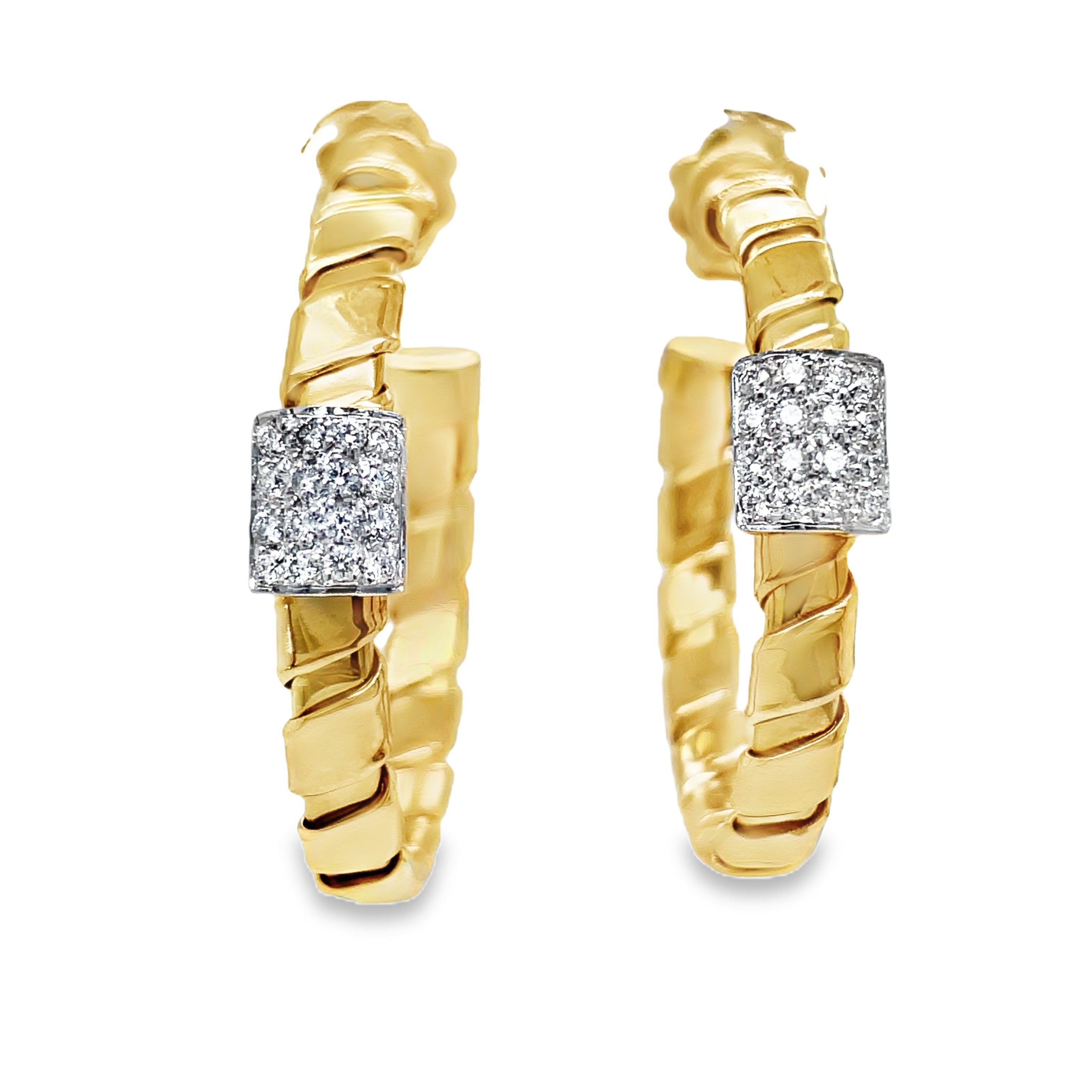 Indulge in luxury with our Italian made,18K two tone gold hoop earrings. Meticulously crafted by Novecentonovantanove, these exquisite earrings feature 0.32 carats of round diamonds and secure friction backs for added convenience. Elevate your style with this elegant and exclusive accessory.