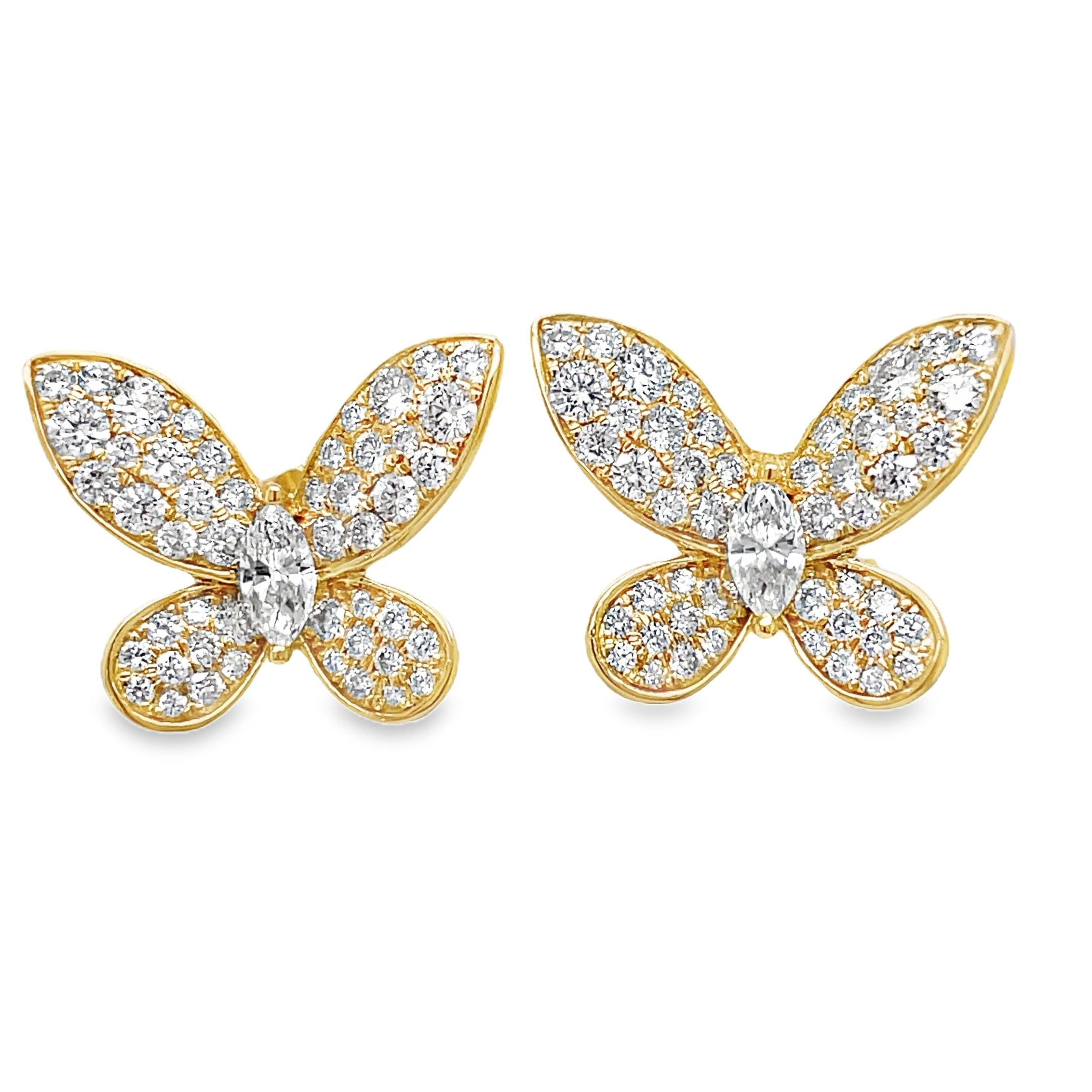 Crafted with exquisite 18k yellow gold and adorned with sparkling round diamonds totaling 1.34 cts, these Medium Size Diamond Butterfly Stud Earrings are a true expression of luxury. The unique combination of round and marquise diamonds creates an elegant butterfly shape that is secured with friction backs, ensuring a comfortable and secure fit. Perfect for adding a touch of sophistication and glamour to any outfit.