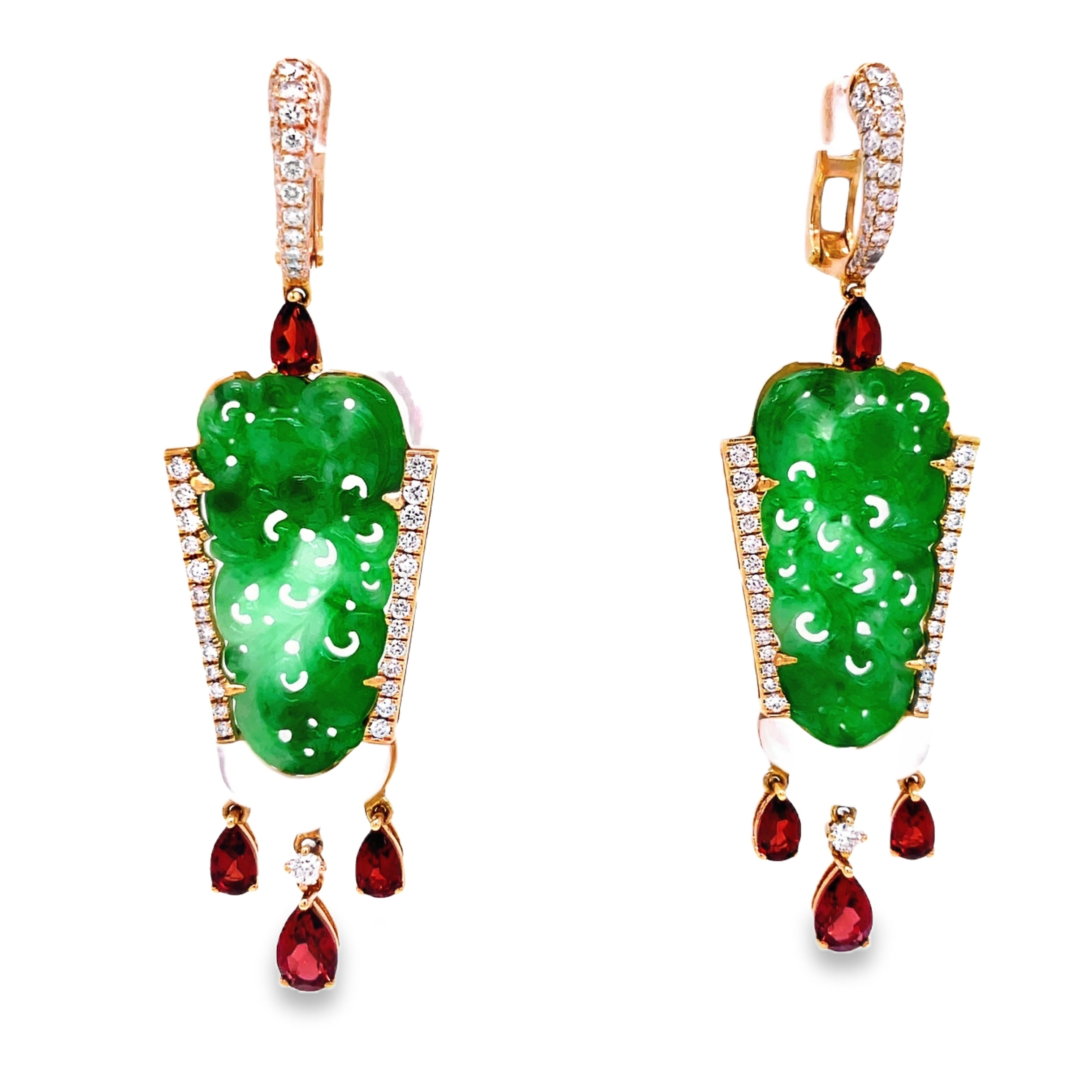 Elevate your style with these stunning green jade earrings hand carved with mother pearl and dazzling round diamonds. The dangling pear shape garnets add a touch of elegance to this 18k yellow gold design. With a secure huggie system, these earrings are 2.5" long. Own a piece of art that will make you stand out.