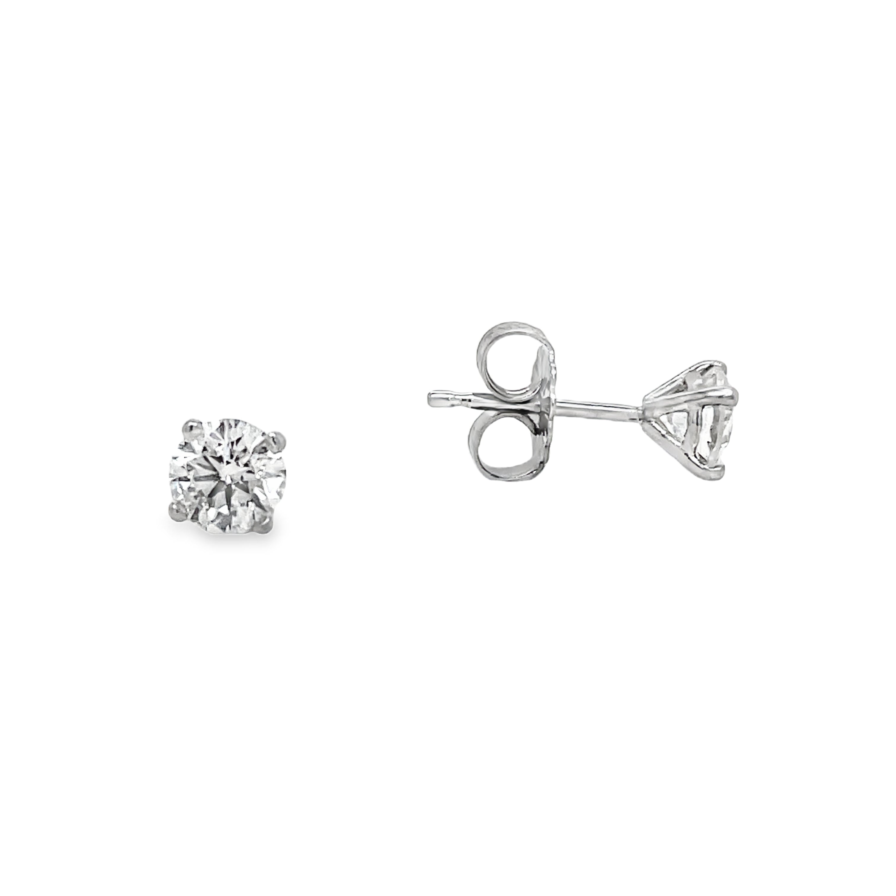 Elevate your style with these Diamond Studs adorned with 0.40 cts of round diamonds. Crafted in 14k yellow gold and featuring a secure screw back system, their brilliant F/G color and VS clarity will add a touch of sophistication to any outfit.