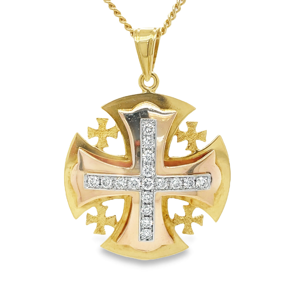 This 18k two-tone; yellow and rose gold, diamond Jerusalem Cross pendant is crafted with 0.50 cts of round diamonds. Believed by some to represent Christ, the large cross and four small crosses represent Mark, Matthew, Luke & John.  Others suggest that the symbol is a visualization of the gospel being spread to the four corners of the Earth. Jerusalem is engraved on the back.