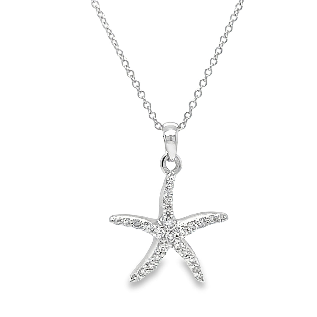 Add a touch of ocean-inspired elegance to your collection with our Diamond Starfish Pendant. The 0.25 ct diamonds set in 14k white gold create a sparkling display 21.00 mm length. Optional 16" chain ($299)  A must-have for any sea lover!"