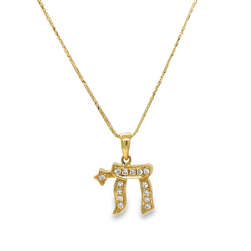 Add a touch of elegance and brilliance to any outfit with our Diamond Chai Pendant! Crafted from 18k yellow gold and adorned with 0.09 cts of round diamonds, this pendant is sure to catch the eye and elevate your style. Perfect for any occasion, it is a must-have for any jewelry lover!" Chain sold separately $280.00