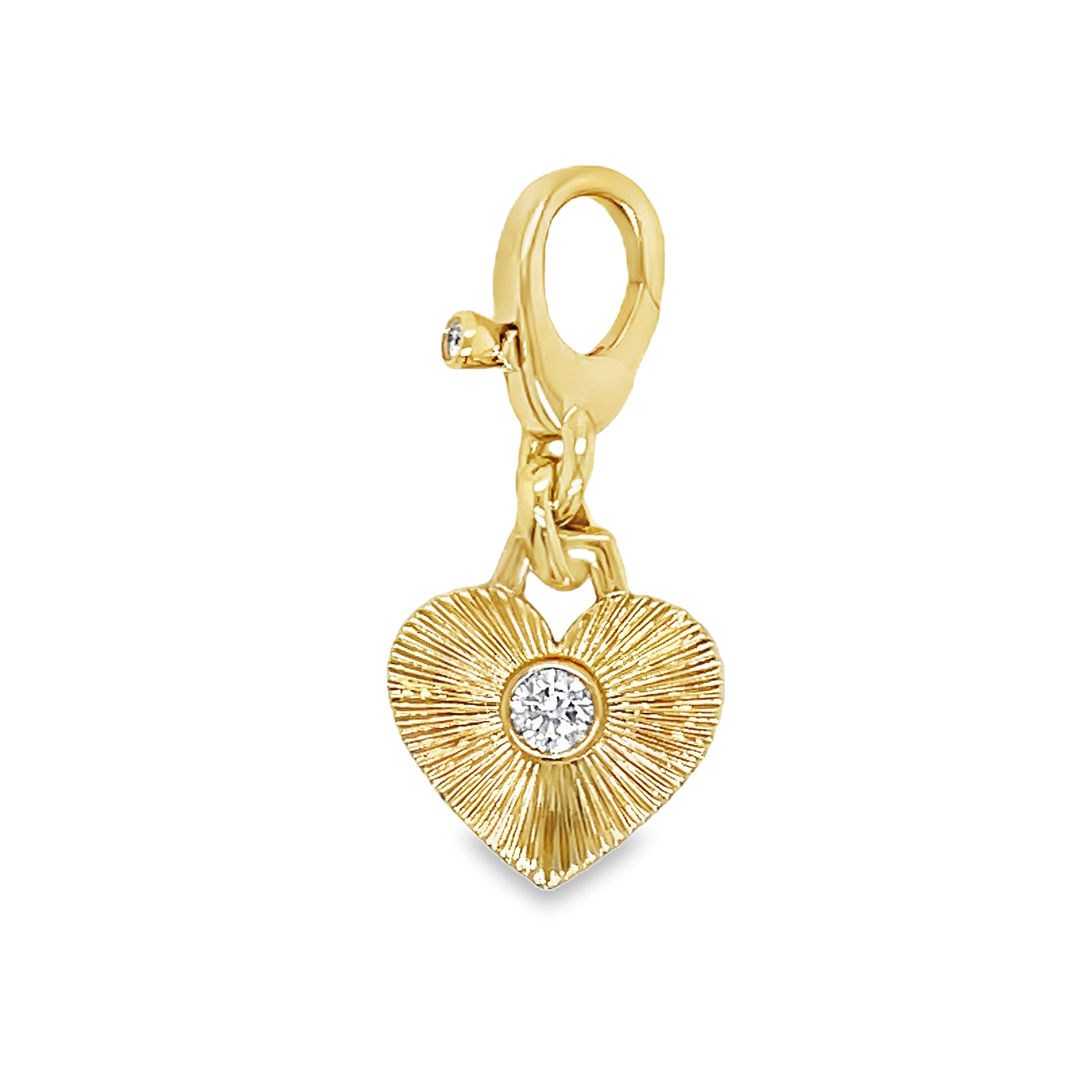 Indulge in luxury with our 14K Yellow Gold Diamond Heart Pendant. Adorned with a 0.15 carat round diamond, this 30.00 mm charm exudes elegance and sophistication. Complete with a deluxe diamond lobster clasp, it's easy to wear on any chain. Upgrade your style game with this timeless piece.