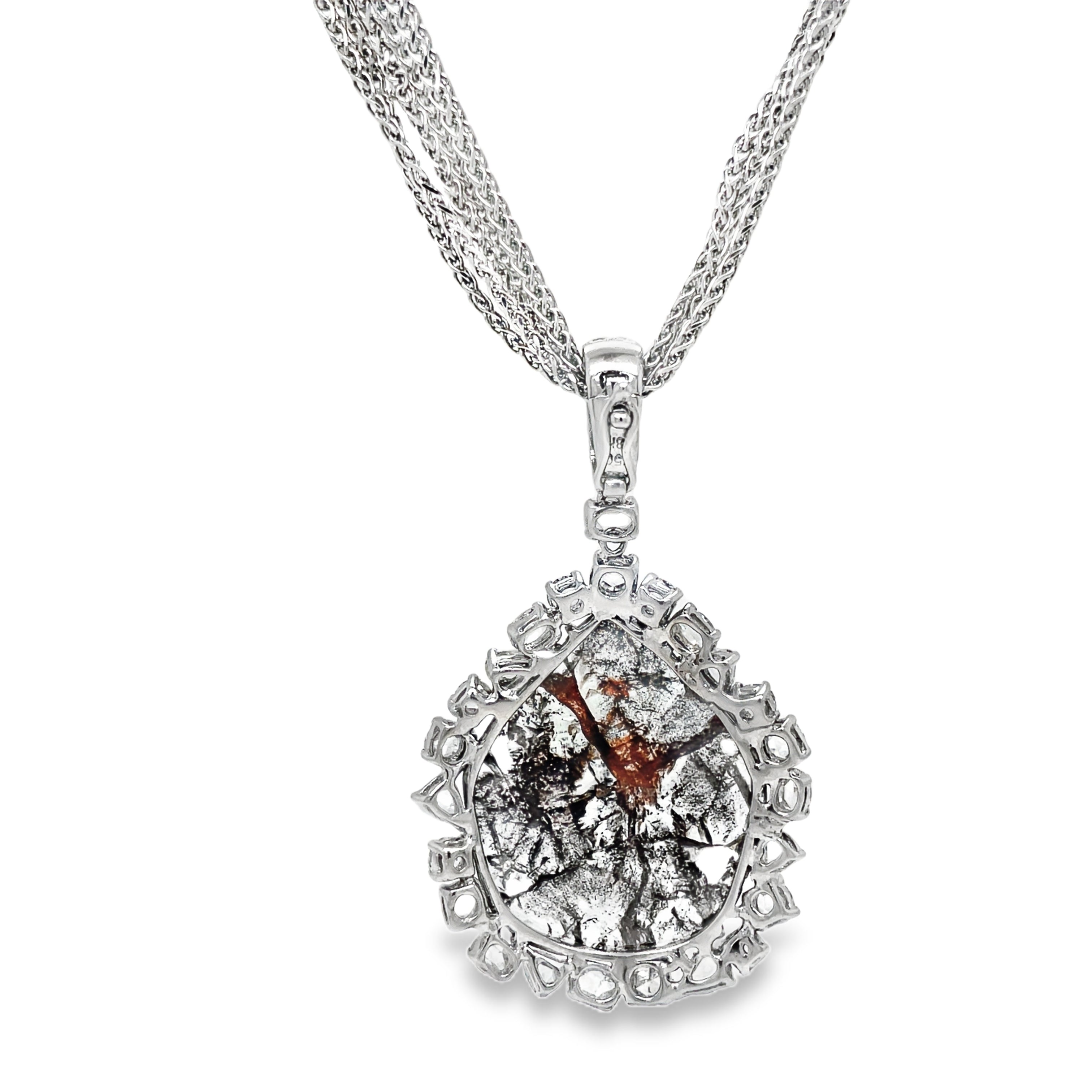 This exquisite pendant features a 5.50 carat diamond slice and a stunning 4.00 carat rose cut diamond pavé bail, all set in luxurious 18k white gold. With a unique enhancer bail and safety lock, this one-of-a-kind piece combines elegance and security for a truly elevated accessory. Pendant does not include chain.

Set of 6 chains sold separate, 16", 11.9 dwt, 14k white gold $2999.00