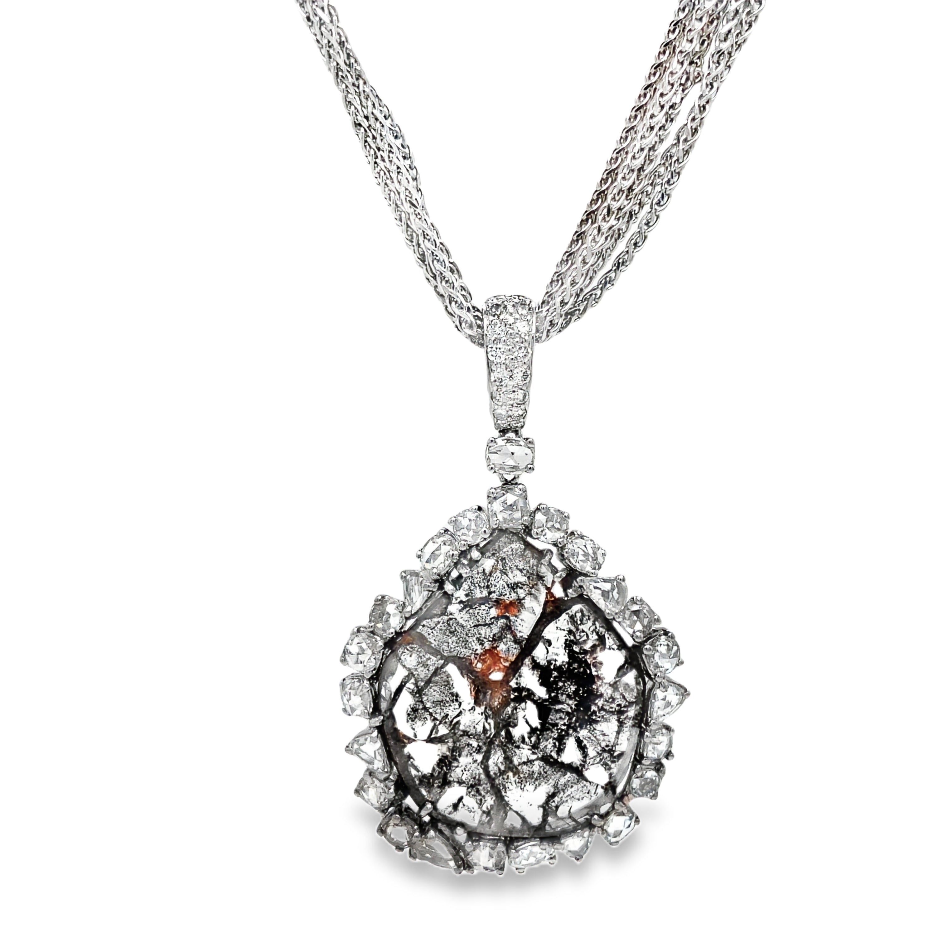 This exquisite pendant features a 5.50 carat diamond slice and a stunning 4.00 carat rose cut diamond pavé bail, all set in luxurious 18k white gold. With a unique enhancer bail and safety lock, this one-of-a-kind piece combines elegance and security for a truly elevated accessory. Pendant does not include chain.

Set of 6 chains sold separate, 16", 11.9 dwt, 14k white gold $2999.00