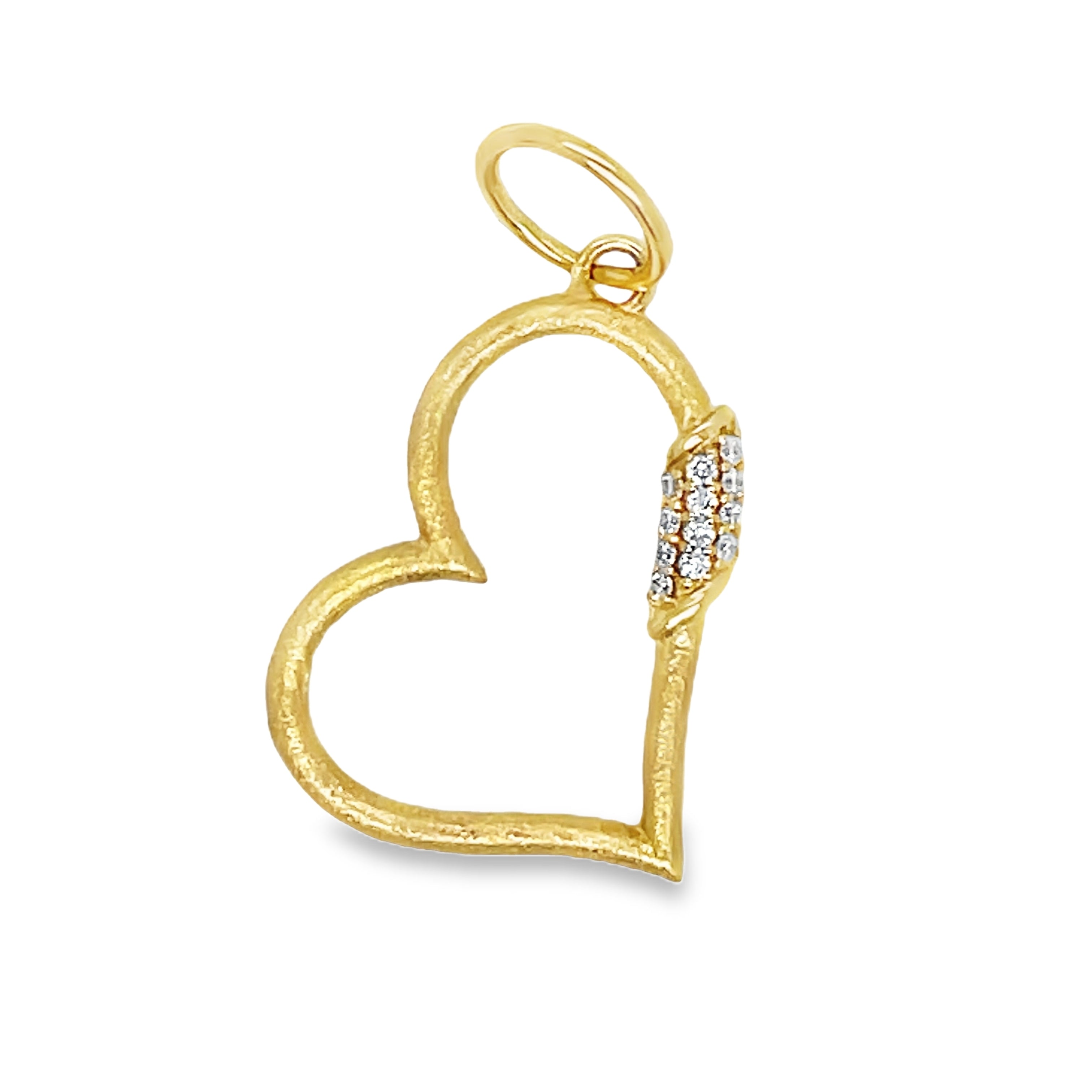 This 14k yellow gold heart pendant features intricate cutouts that add a touch of elegance to any outfit. Adorned with shimmering round diamonds, this pendant is the perfect accessory for those who appreciate sophisticated and exclusive jewelry. Embrace your inner luxury with this medium open heart pendant.