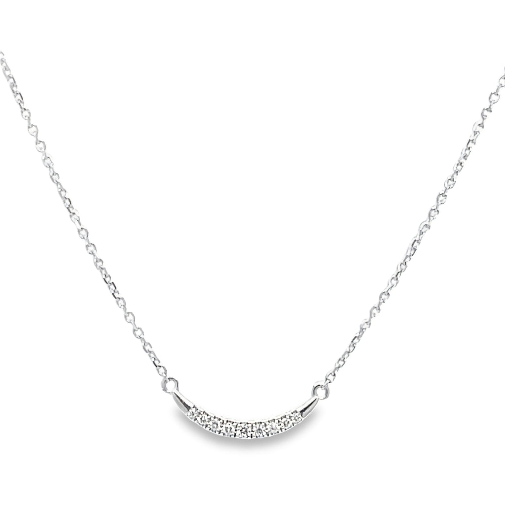 Add a touch of elegance to any outfit with our stunning Curve Diamond Bar Necklace. This exquisite piece features 0.05 carats of shimmering diamonds set in 18k white gold for a timeless and luxurious look. The necklace is 18" long with a sizeable loop at 16" for a perfect fit. Elevate your style with this must-have accessory.