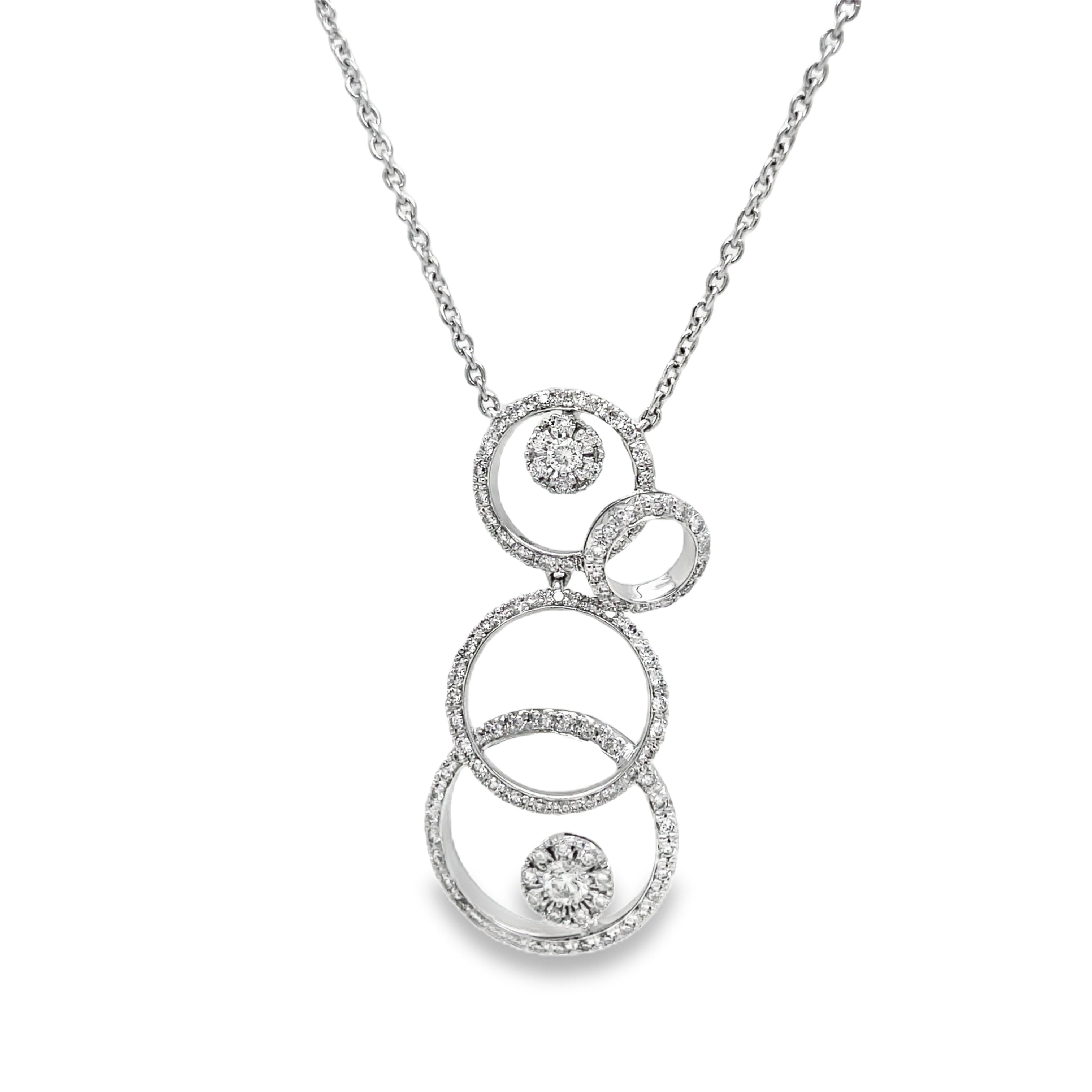 ndulge in the ultimate luxury with our Diamond Circle Pendant Necklace. Four graduated circles, embellished with 1.00 cts of round diamonds, dangle elegantly from a delicate 16" 18k white gold chain. The secure lobster clasp ensures a perfect fit, making this necklace a timeless addition to your collection.