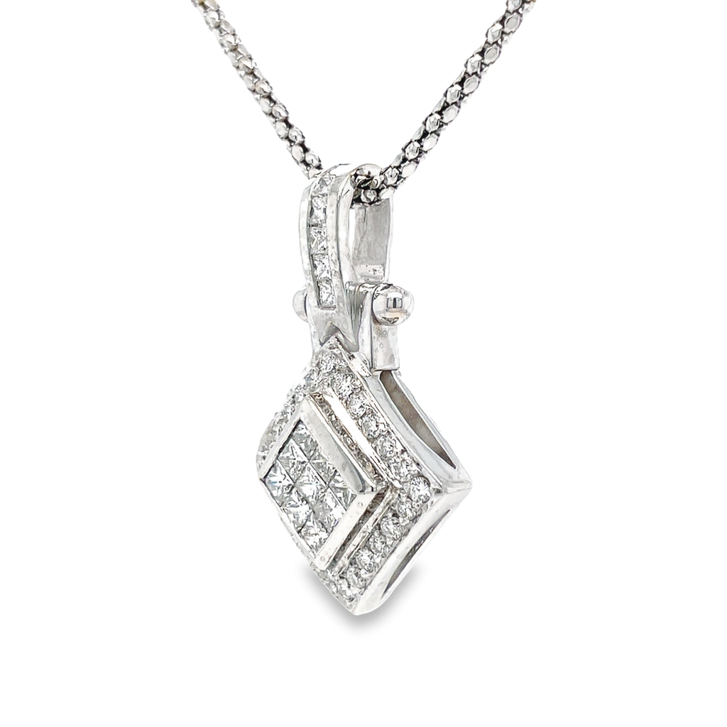 Elevate any outfit with our exquisite 18k Princess Cut Diamond Rhombus Pendant Necklace! Crafted in stunning 18k white gold, this necklace features 1.20 carats of sparkling princess cut diamonds in a unique rhombus shape. Secured with a lever system, this necklace will add elegance and sophistication to any look. Shop now and feel luxurious!