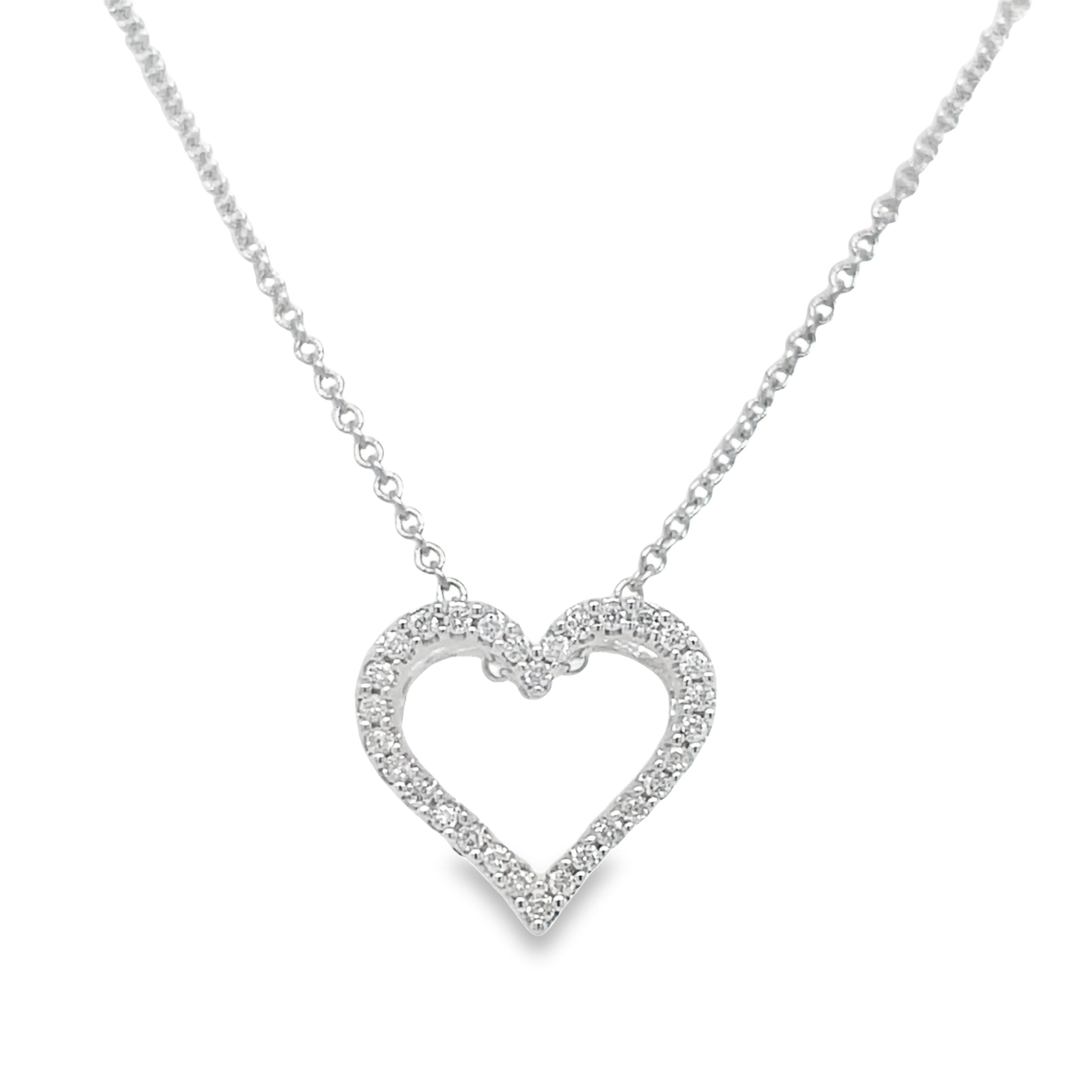 Express your love with this stunning Cut Out Heart Diamond Pendant Necklace. Made with 18k white gold, this pendant features a heart shape cut out and 0.11 cts of round diamonds. The secure lobster clasp and slide system makes it easy to wear, while the 18" white gold chain adds the perfect touch of elegance.
