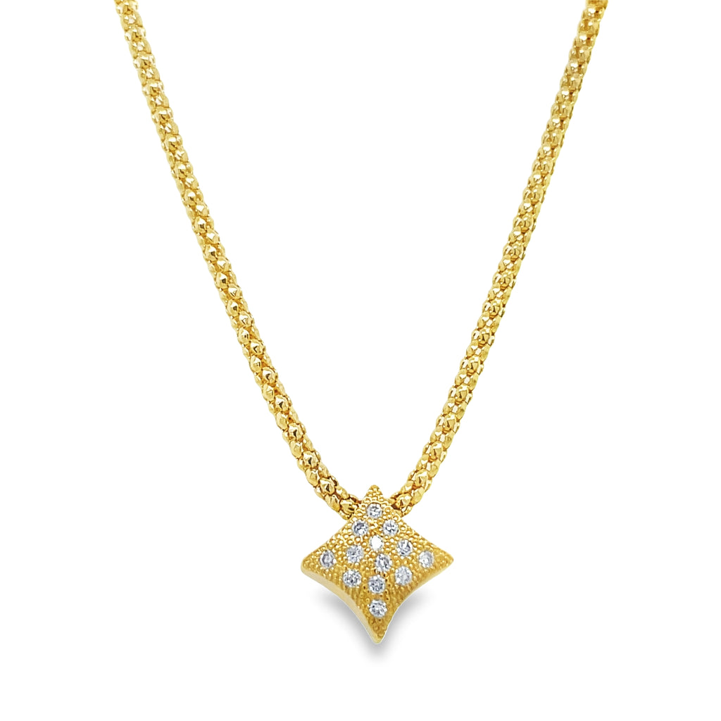 Be the star of the show with this Italian made necklace from the Rockstar Collection! The 18kt yellow gold mesh style chain has a star adorned with pave diamonds 0.20 cts. This necklace adds a touch of elegance while the secured lobster clasp ensures it stays in place. At 18" long, it's the perfect accessory for any outfit.