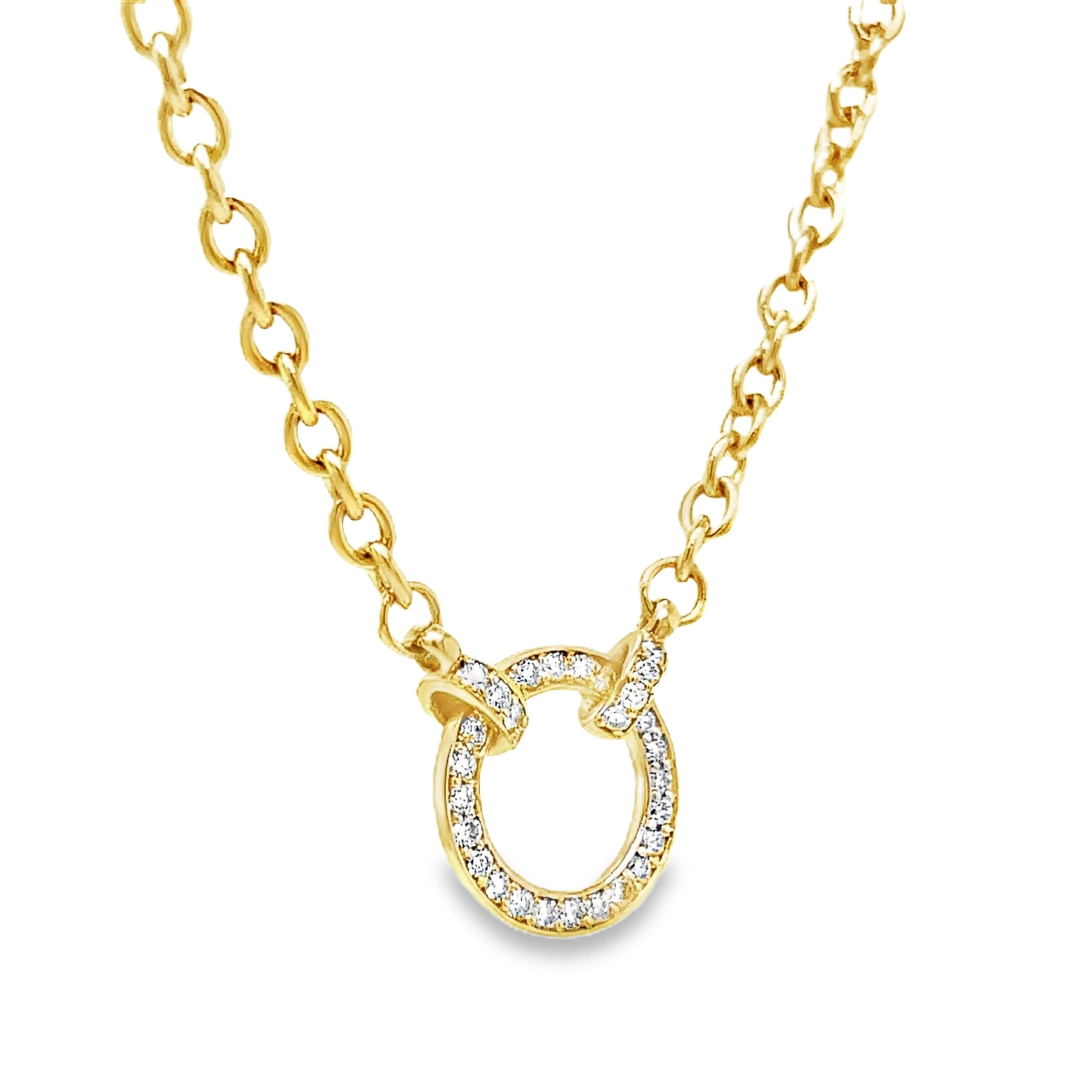 Wrap yourself in luxury with our exquisite Diamond Circle Yellow Gold Necklace. The delicate cable chain, 18" long, features a secure lobster clasp and a dazzling diamond circle, adorned with round diamonds totaling 0.31 carats. Elevate any outfit and make a statement with this timeless piece of fine jewelry.