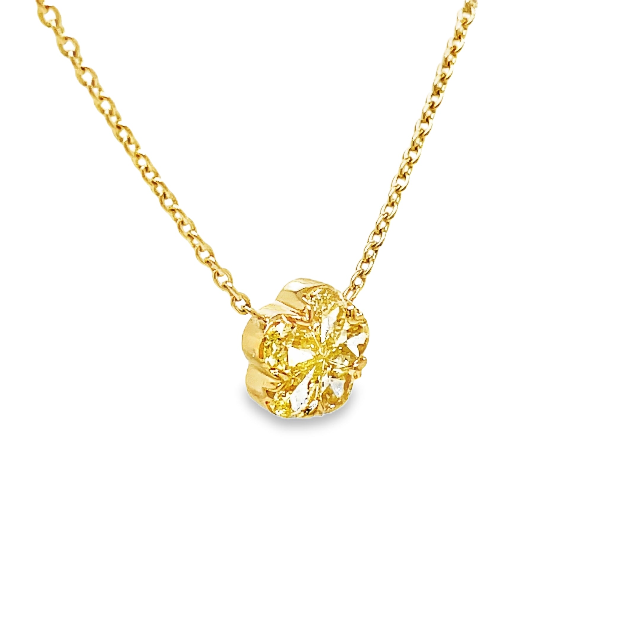 Elevate your style with our Fancy Yellow Diamond Flower Pendant Necklace. This exquisite piece features 0.66 cts of fancy yellow diamonds set in a delicate flower motif, all crafted in 18k yellow gold. Add a touch of luxury to any outfit with this stunning pendant necklace.