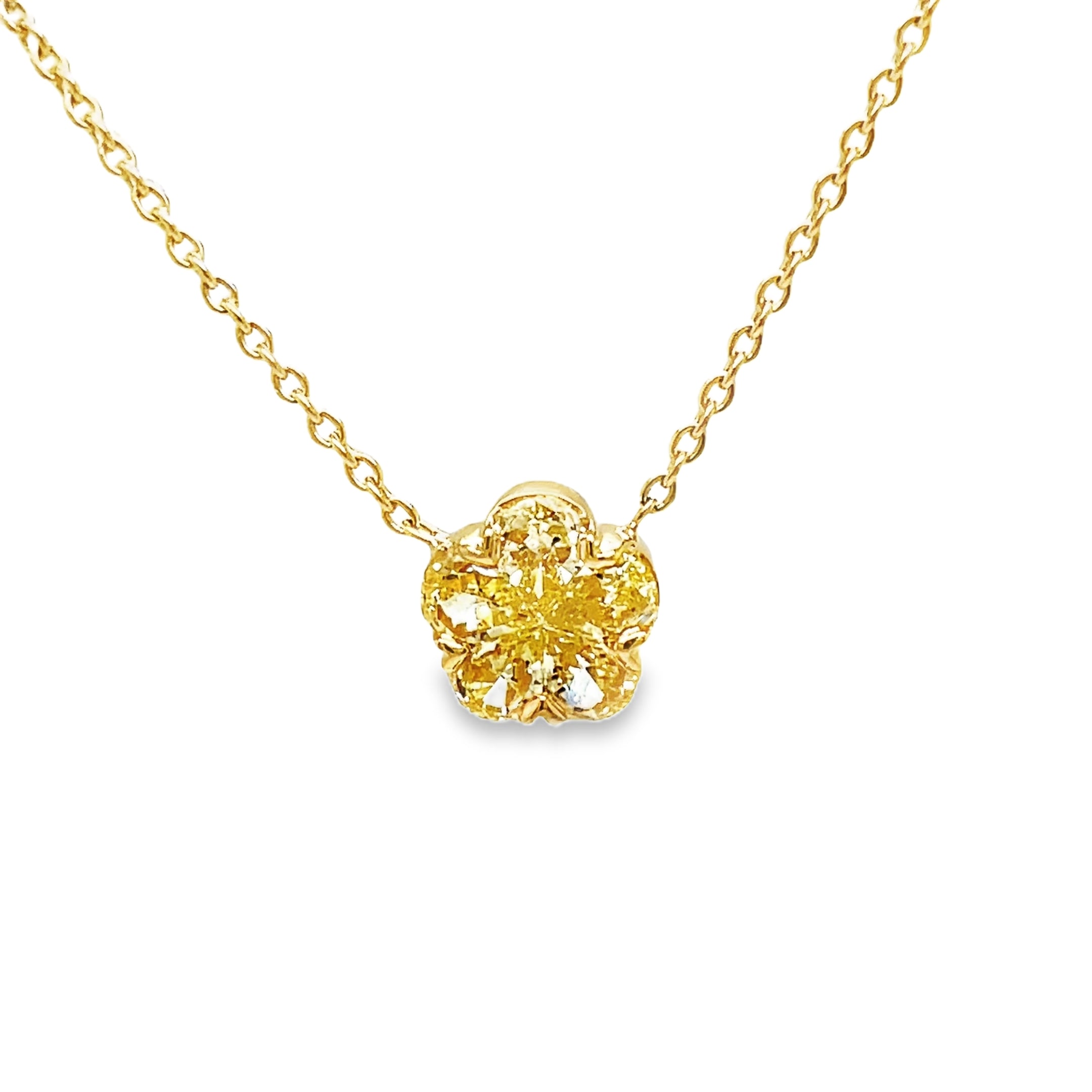 Elevate your style with our Fancy Yellow Diamond Flower Pendant Necklace. This exquisite piece features 0.66 cts of fancy yellow diamonds set in a delicate flower motif, all crafted in 18k yellow gold. Add a touch of luxury to any outfit with this stunning pendant necklace.