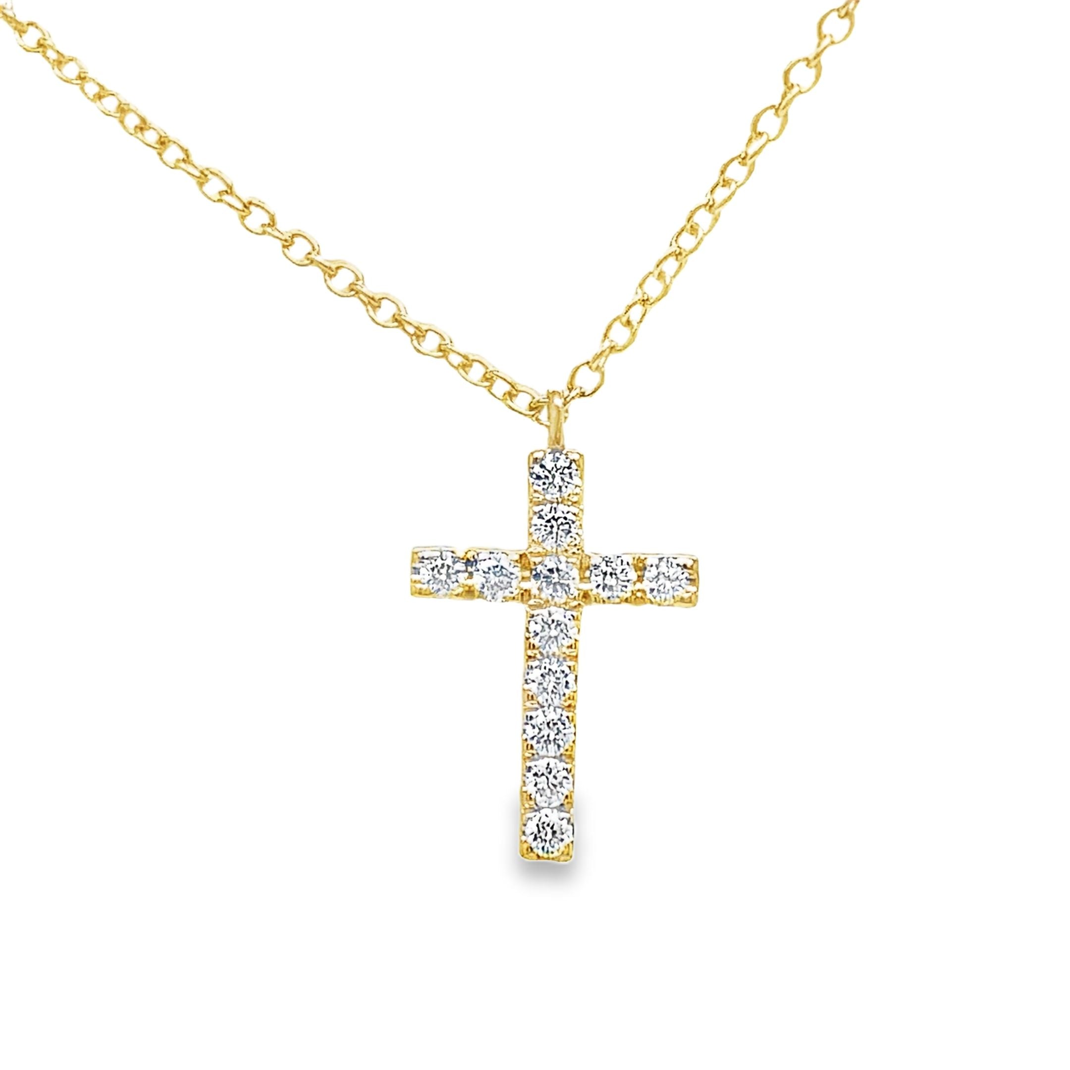 Indulge in the opulence of our 18K Italian Made Reversible Diamond &amp; Pink Sapphire Cross Pendant Necklace. Handcrafted with 18k yellow gold, this luxurious piece features a reversible cross adorned with 0.21 cts of sparkling diamonds on one side and 0.25 cts of deep pink sapphires on the other. Complete your look with the included 18" yellow gold chain. Elevate your style with this exquisite necklace.