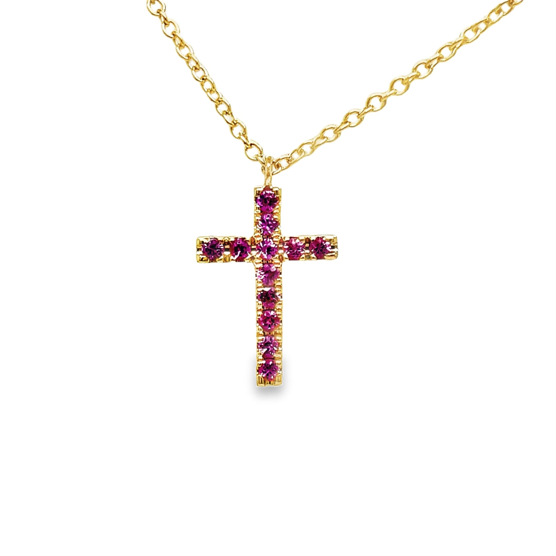 Indulge in the opulence of our 18K Italian Made Reversible Diamond &amp; Pink Sapphire Cross Pendant Necklace. Handcrafted with 18k yellow gold, this luxurious piece features a reversible cross adorned with 0.21 cts of sparkling diamonds on one side and 0.25 cts of deep pink sapphires on the other. Complete your look with the included 18" yellow gold chain. Elevate your style with this exquisite necklace.