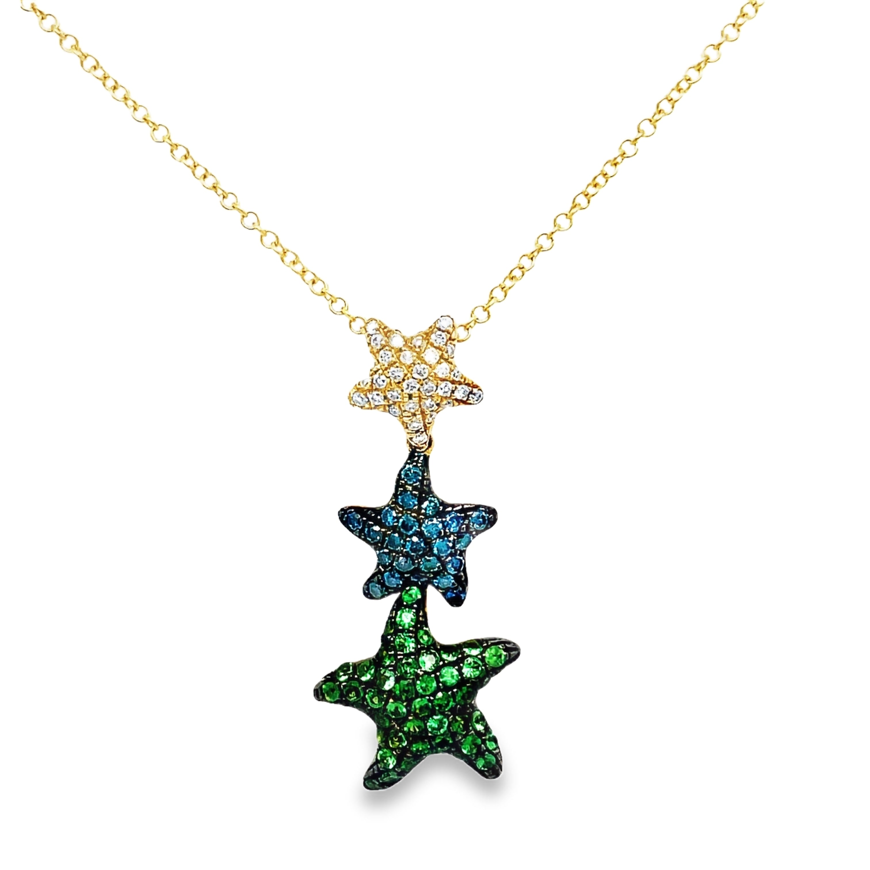 Indulge in luxury with our Triple Starfish Necklace. Crafted with three delicate starfish pendants, this necklace features tsavorite yellow gold and dazzling diamonds. Elevate your style with this exclusive piece that will surely make a statement wherever you go.