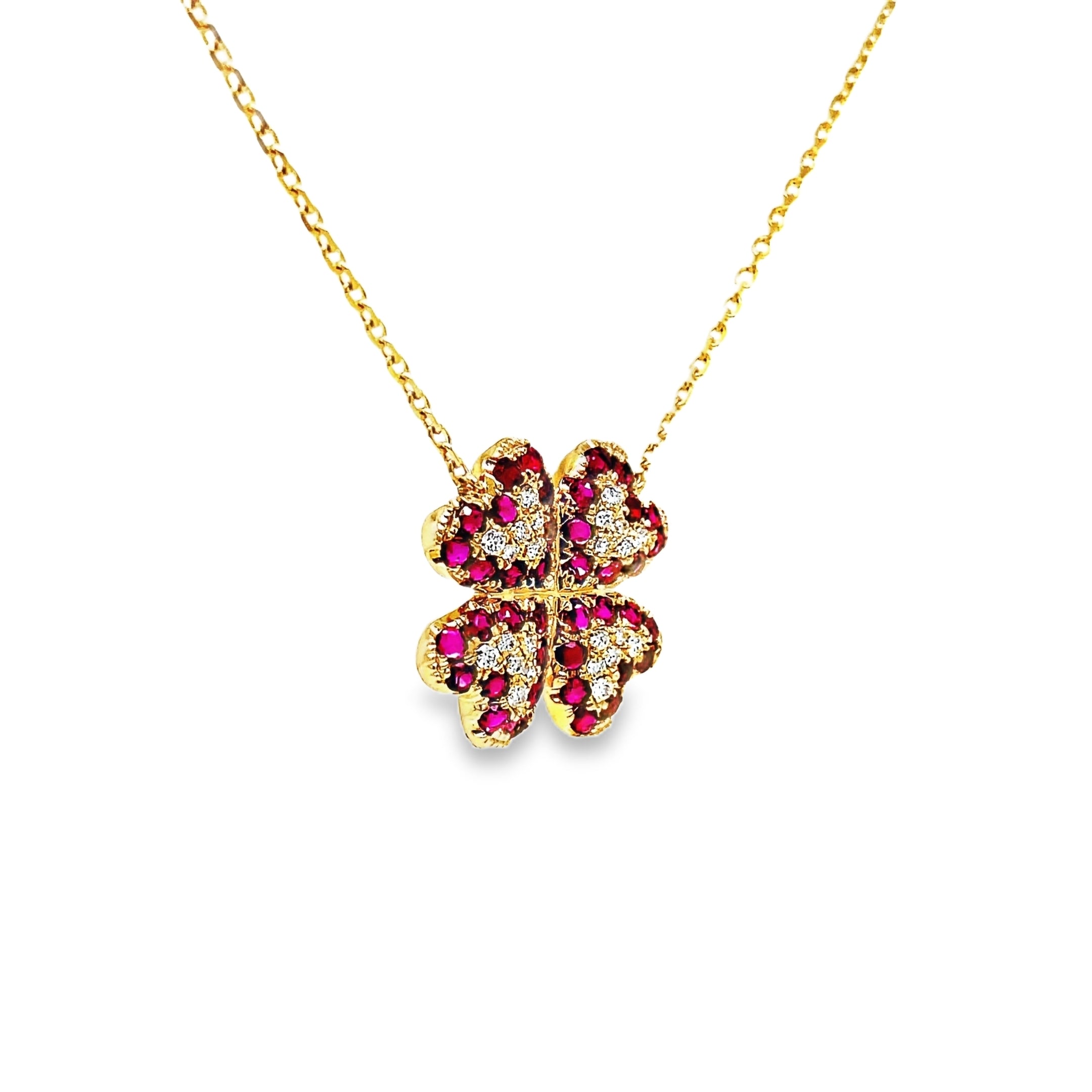 Exude elegance with our Four Petal Ruby and Diamond Pendant Necklace. Adorned with stunning round rubies totaling 0.95 cts and shimmering round diamonds totaling 0.16 cts, this 14k yellow gold necklace boasts a sophisticated four petal flower design. Elevate your style and make a statement with this exclusive piece.